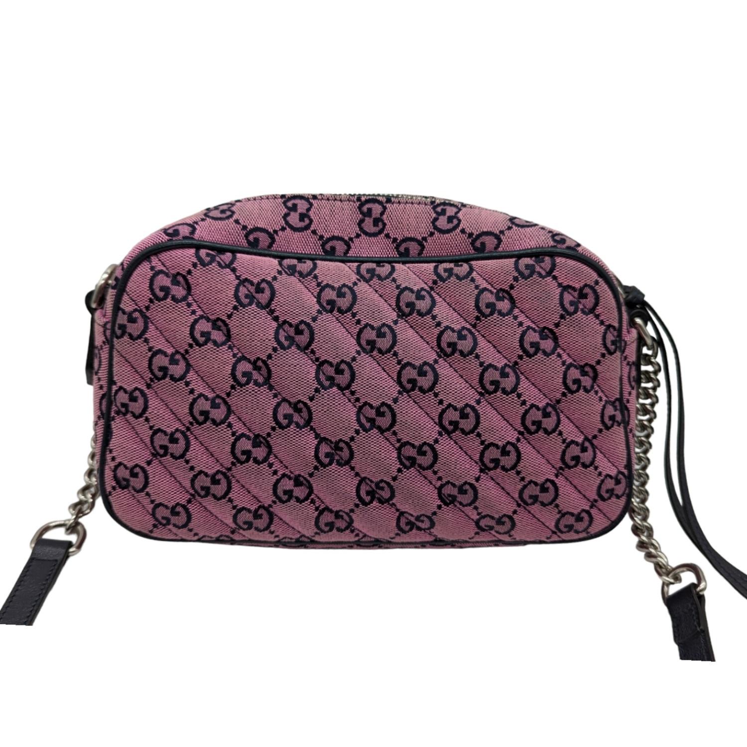 GUCCI Monogram Matelasse Diagonal Small GG Marmont Chain Shoulder Bag in Pink and Blue. This stylish shoulder bag is crafted of pink Gucci monogram with blue leather trim and features a blue leather and silver chain link adjustable shoulder strap