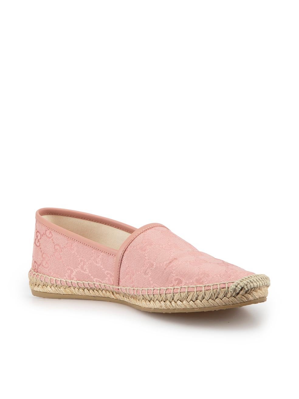 CONDITION is Very good. Minimal wear to espadrilles is evident. Minimal creasing to back heels on this used Gucci designer resale item.

Details
Pink
Cloth
Espadrille flats
Round toe
Slip on
'GG' logo pattern
  
Made in Spain

Composition
EXTERIOR: