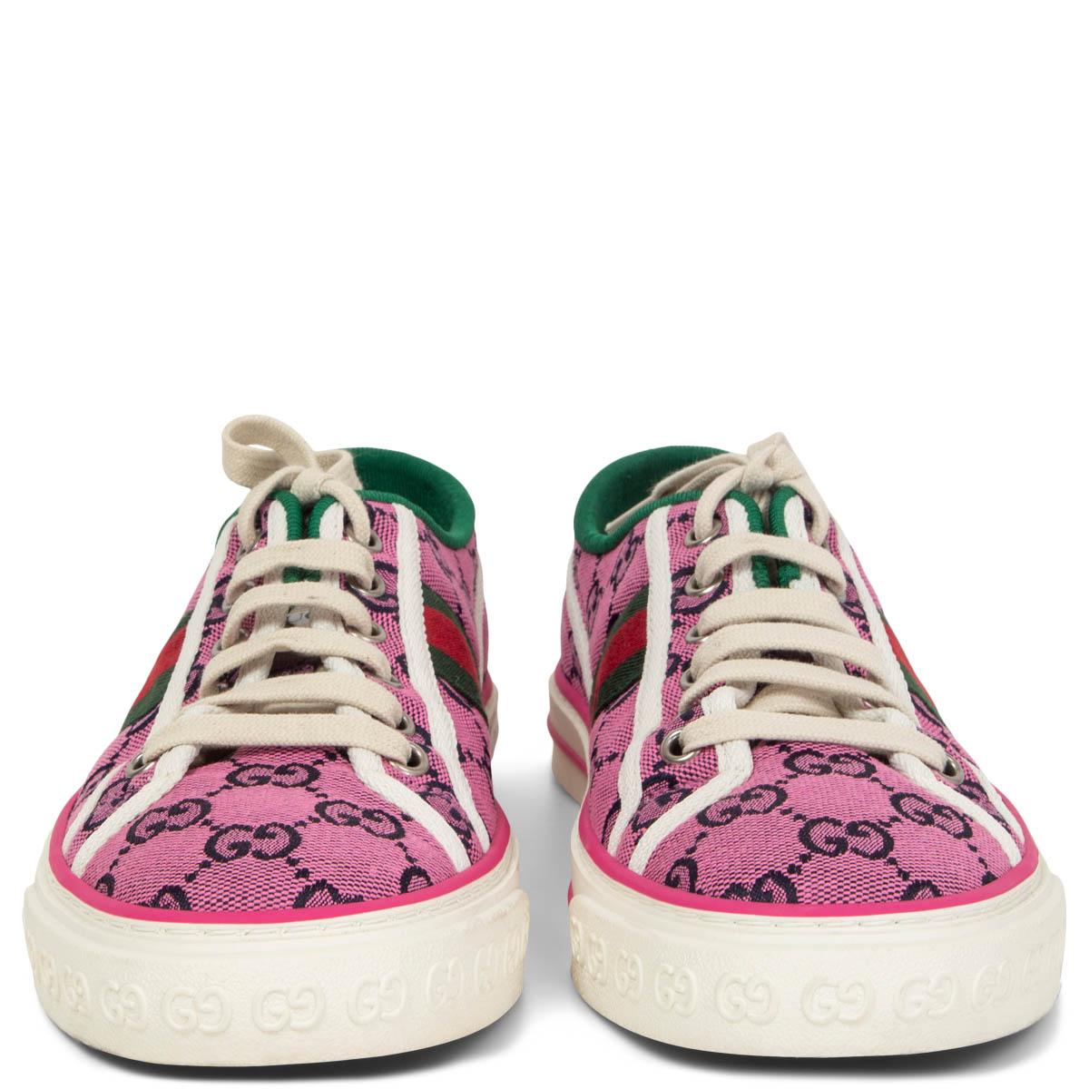 100% authentic Gucci Tennis 1977 GG sneaker crafted from pink and navy organic jacquard denim. With an allover GG motif and signature Web stripe on the side. Have been worn once and are in virtually new condition. Come with dust bag.
