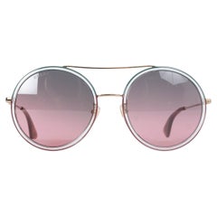 Lunettes de soleil GUCCI rose GG0061S ROUND