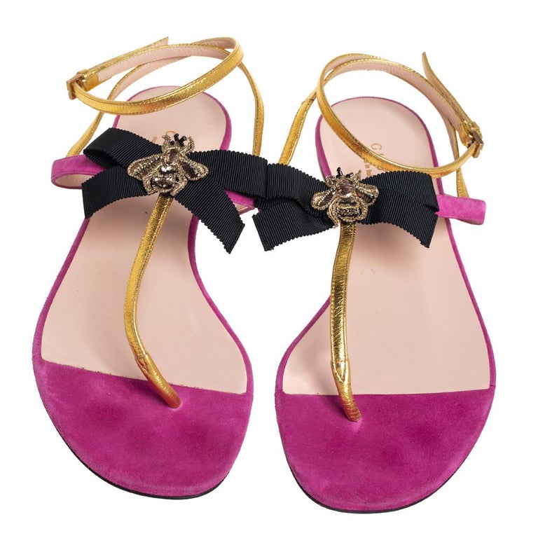 Gucci Pink/Gold Suede And Leather Moody Bow Flat Thong Sandals Size 37 at  1stDibs | gucci bee sandals, gold bow flat sandals, gold gucci thong sandals
