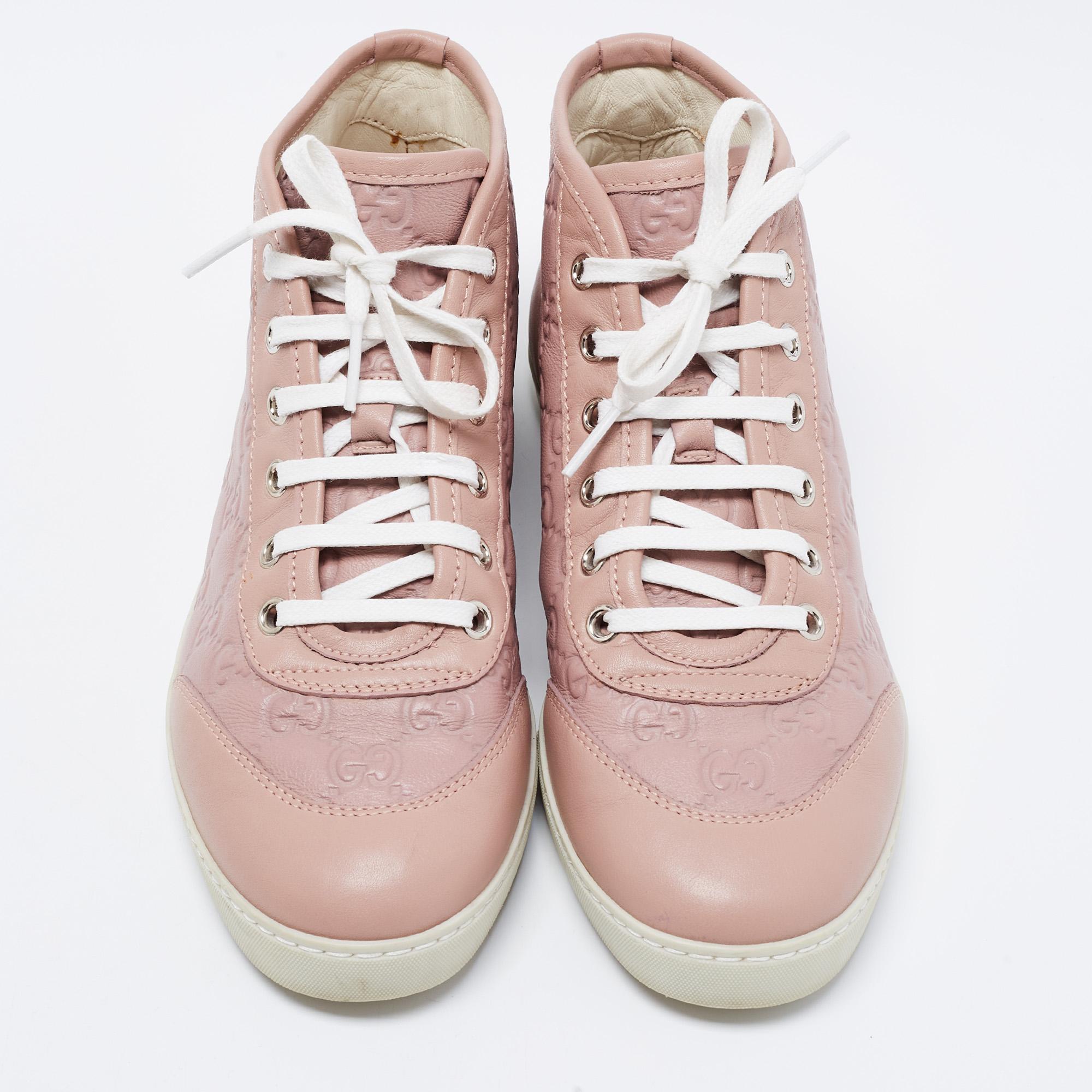 If you wish to move in style, then these Gucci sneakers are the perfect option for you. They are created from Guccissima leather with lace-up vamps, a brand signature on the heels, and rubber soles.

