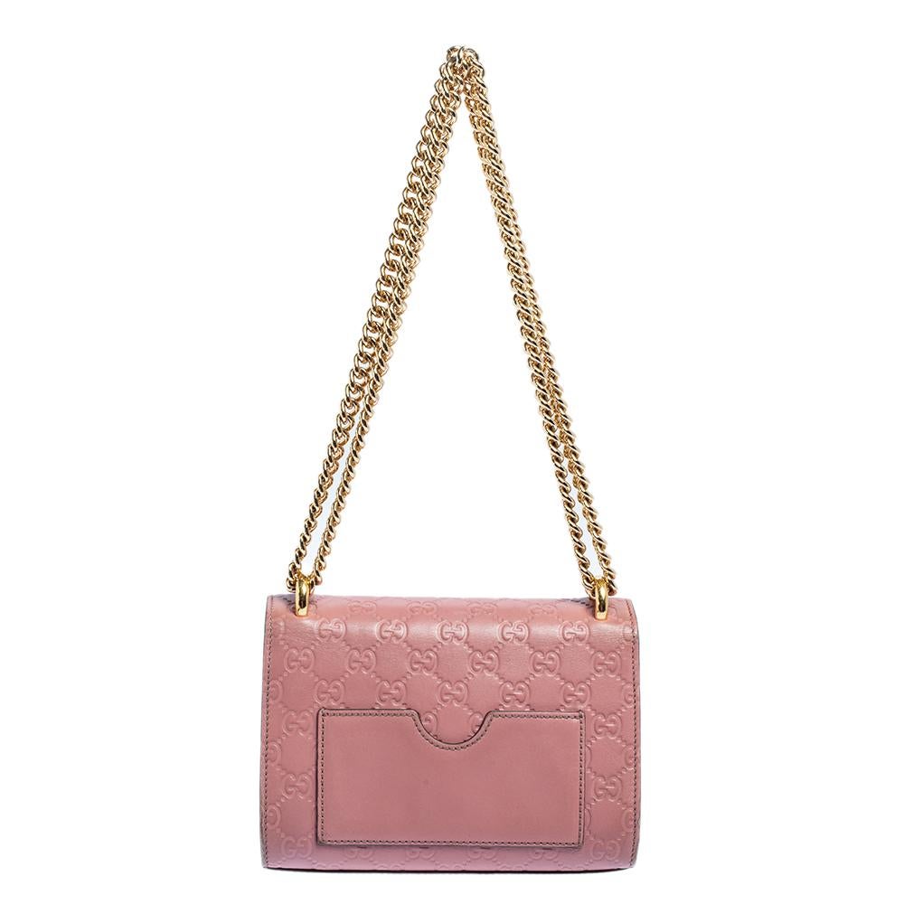 This chic and contemporary Gucci bag will help you outline a stylish look and outshine everyone else! Crafted from Guccissima leather, the rear side comes with a slip pocket for easy organization. The structured silhouette is secured with a