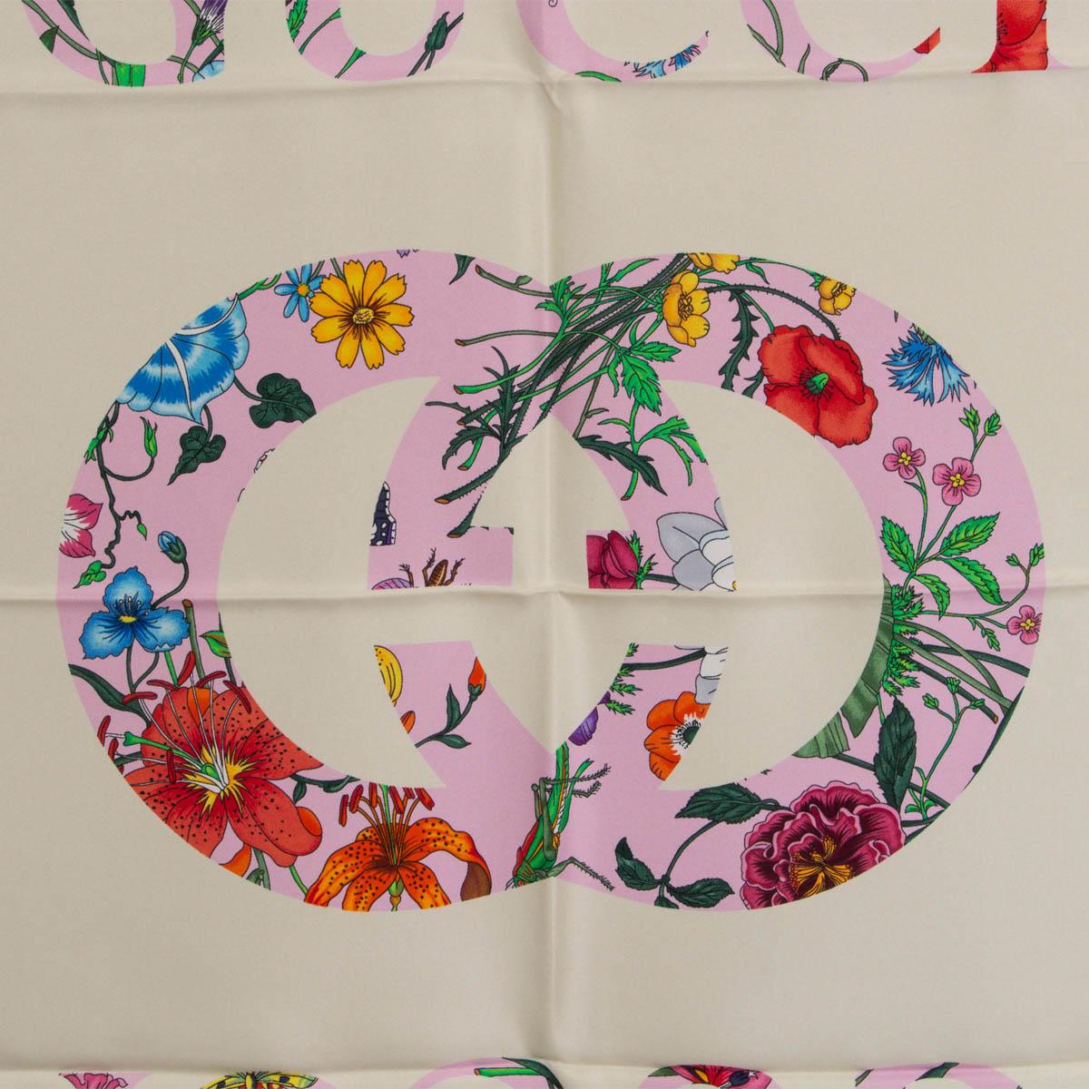100% authentic Gucci Flora GG Vinatge print shawl in light pink and ivory silk (100%) combines two of the House's most distinctive designs into an unexpected and contemporary pattern. The historic Flora motif, first presented by Vittorio Accornero
