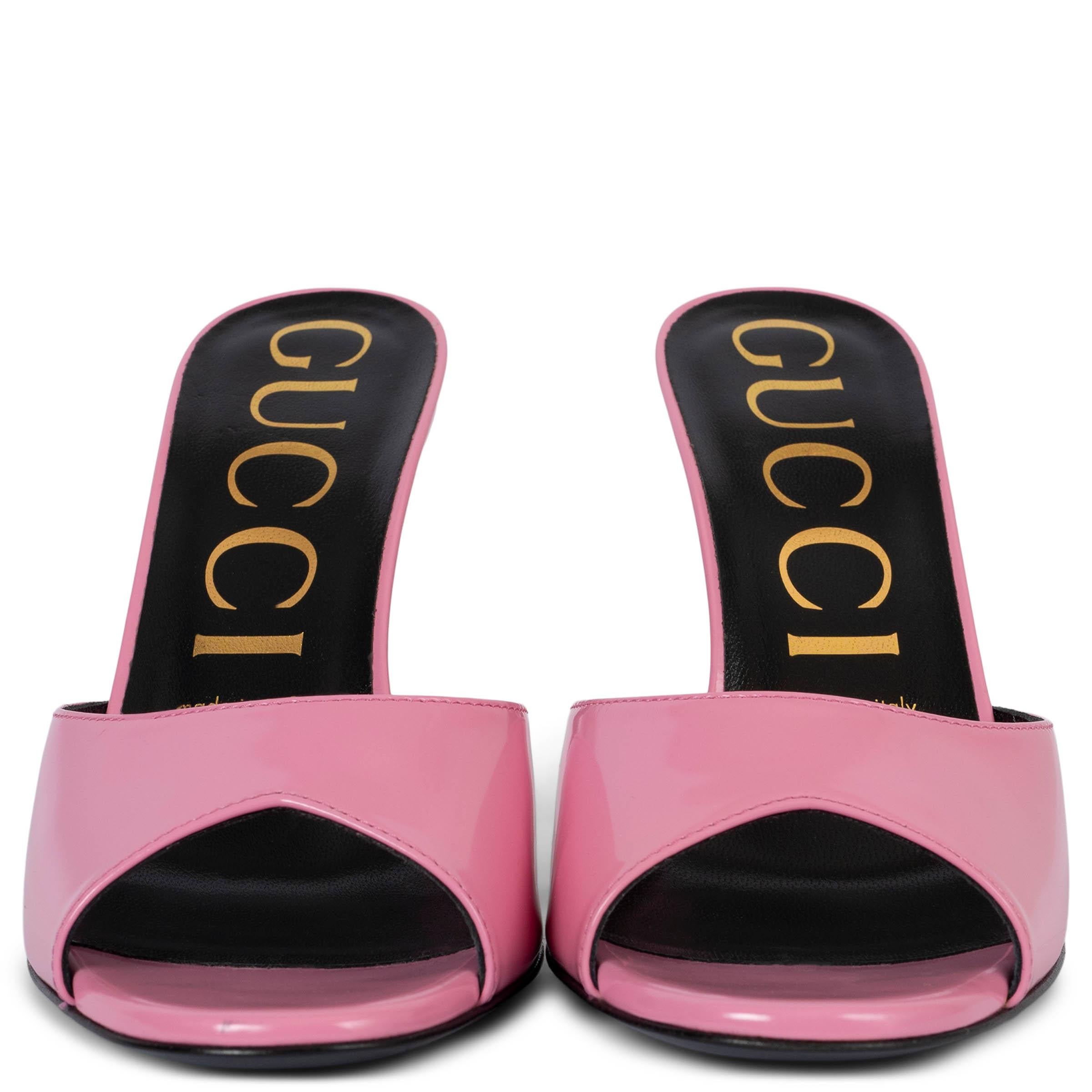 Mules de tacón alto 100% auténticos Gucci Scarlet en piel de becerro pulida rosa. A estrenar. 

2019 Otoño/Invierno

Medidas
Tamaño impreso	38
Talla de zapato	38
Suela interior	25cm (9.8in)
Anchura	7.5cm (2.9in)
Talón	10 cm

Todos nuestros anuncios