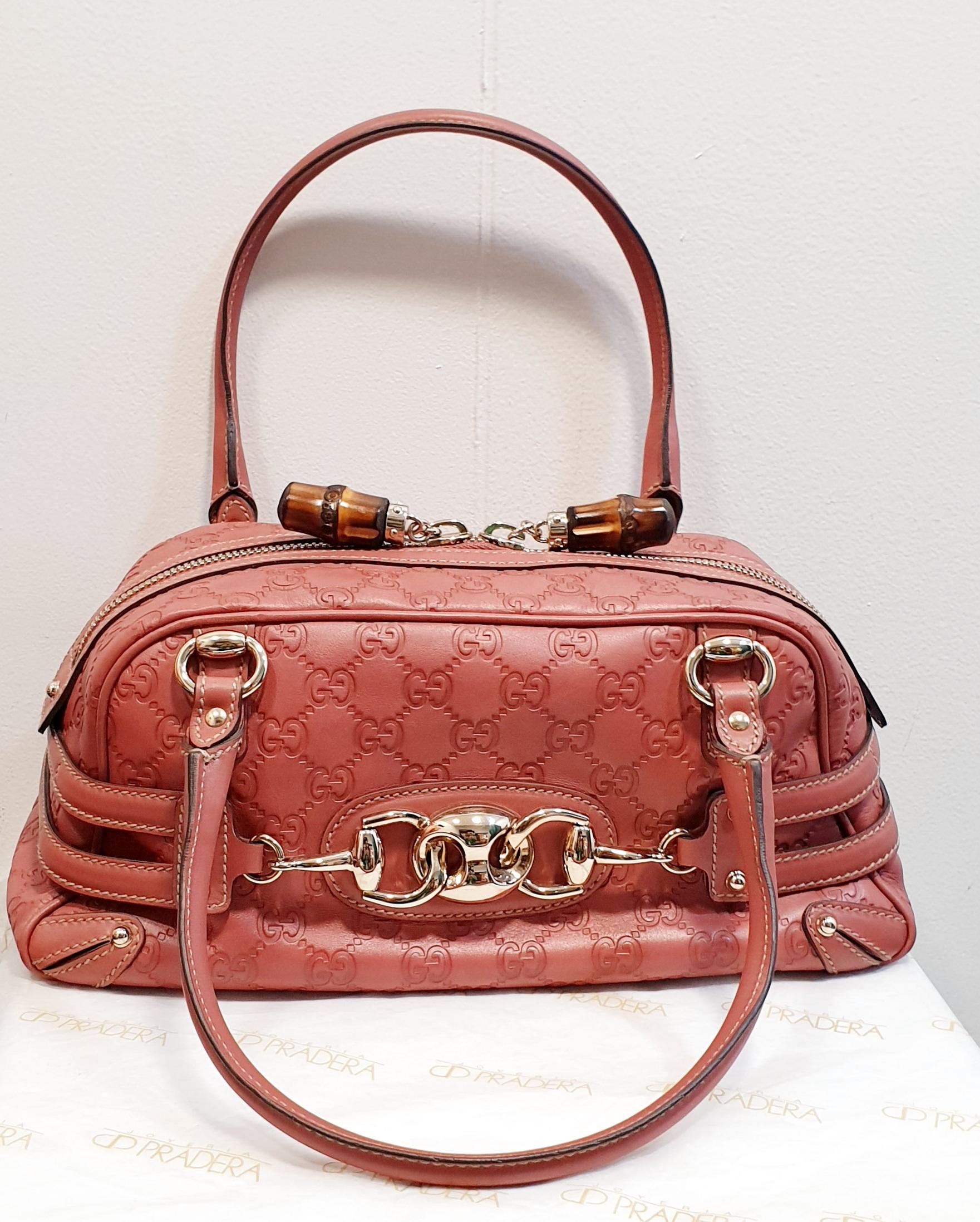 Gucci Pink Leather Bag With Bamboo Closure and big golden horsebit  logo
Rest of boutique stock never used

Double round leather strap: 6.5