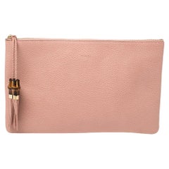 Gucci Pink Leather Bamboo Braided Tassel Zip Clutch