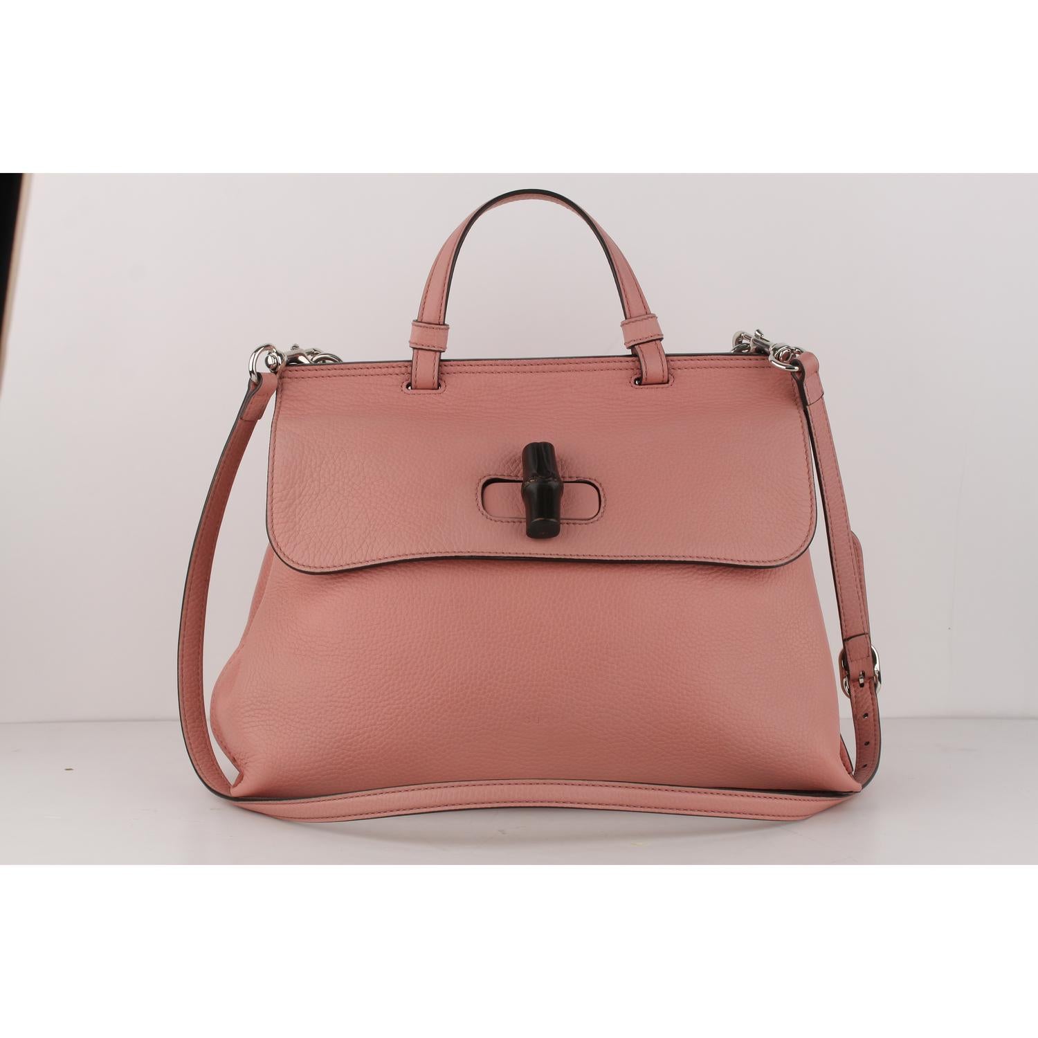 Gucci Pink Leather Daily Bamboo Satchel Top Handle Bag

Material : Leather 
Color : Pink
Model : Daily Bamboo 
Gender : Women
Country of Manufacture : Italy
Size : Medium

Bag Depth : 5 inches - 14 cm 
Bag Height : 9 inches - 22,8 cm 
Bag Length :