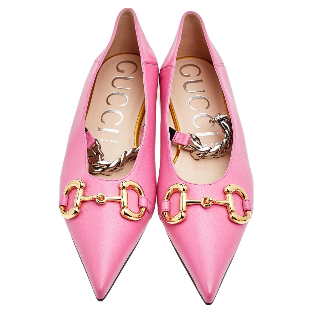 From the House of Gucci, here are these flawless Deva ballet flats that will undoubtedly grant your feet with a chic aesthetic and signature beauty. They are made from pink leather with a gold-toned Horsebit motif enriching the pointed toes. A