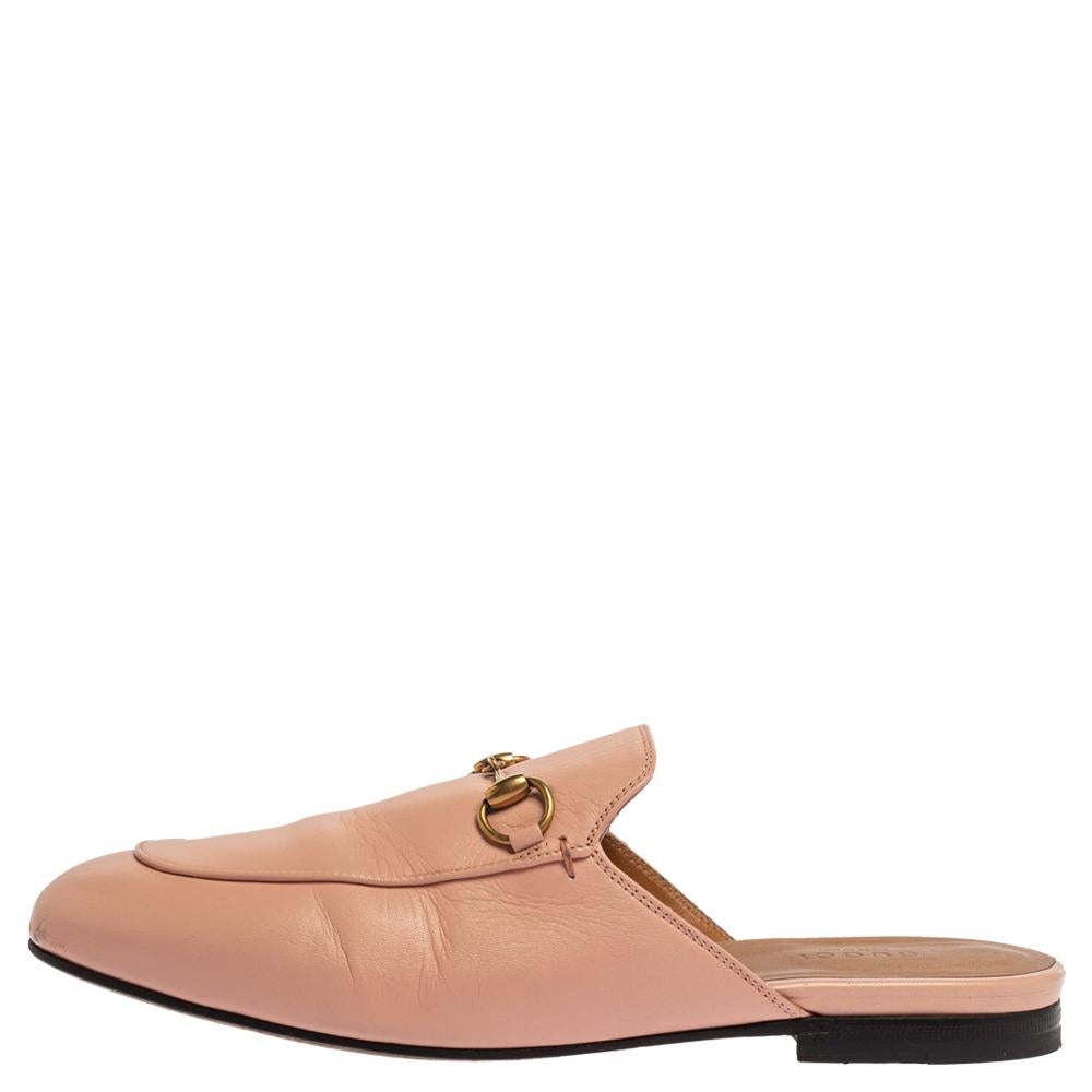 First introduced as part of Gucci's Fall Winter 2015 collection, the Princetown mules are an absolute favorite worldwide and have been worn by countless celebrities. These mules have been designed in pink leather and detailed with the signature