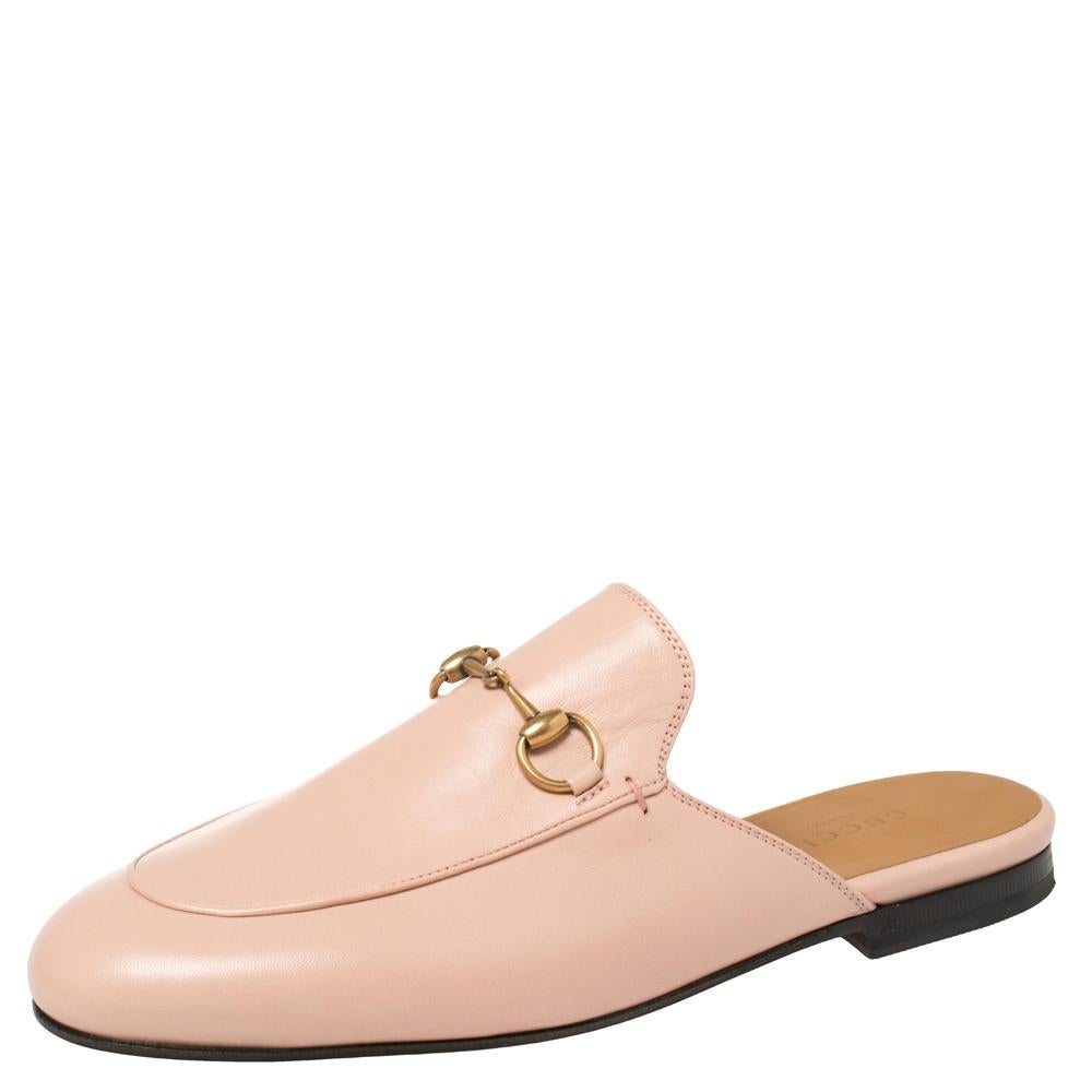 These Gucci Princetown mules are a fresh update on the perennially chic Gucci loafers. They are enhanced by the signature Horsebit hardware details that have defined the Gucci collection since the very beginning. Featuring a pink leather body, these