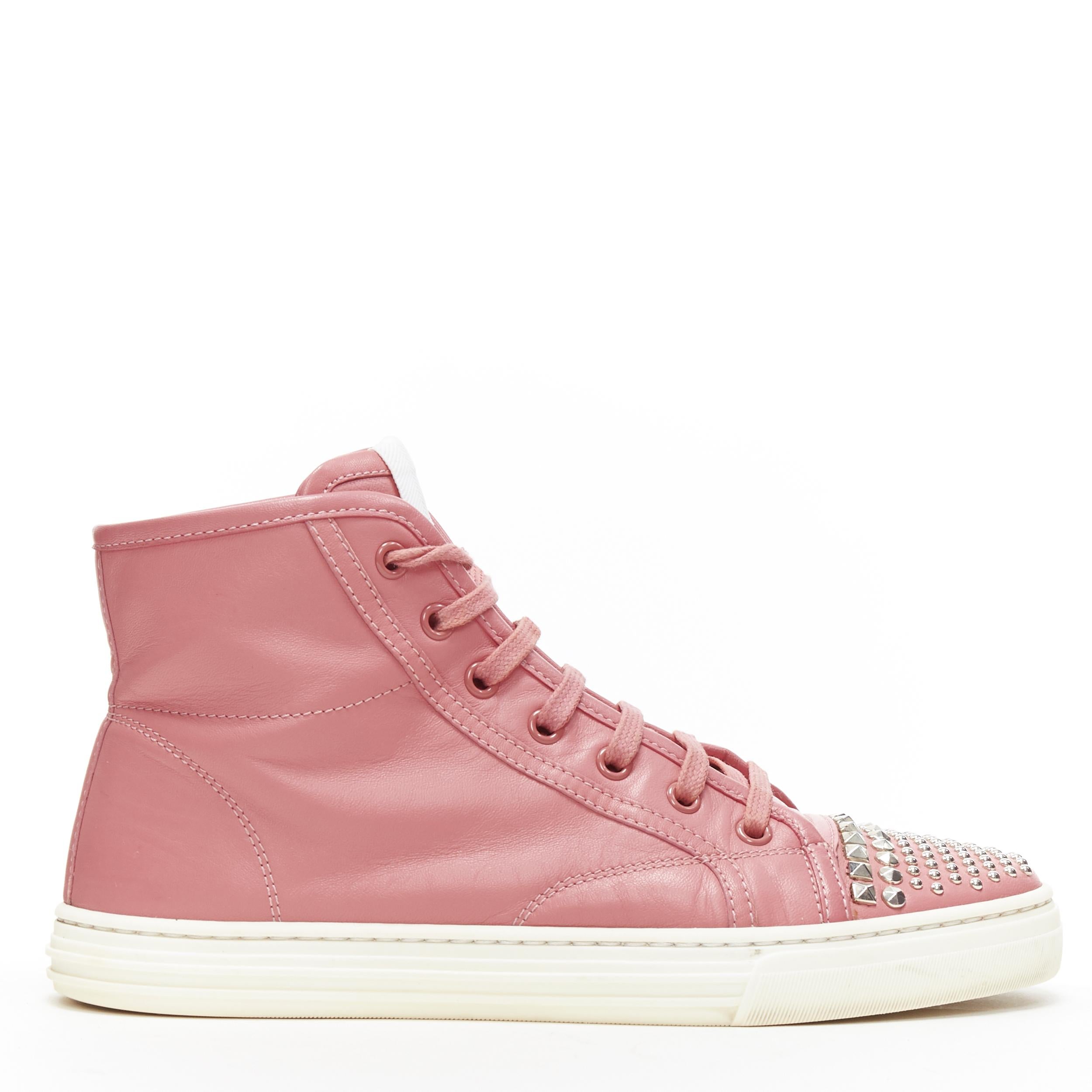 GUCCI pink leather studded toe cap high top casual sneakesr EU36.5
Brand: Gucci
Model Name / Style: High top sneakers
Material: Leather
Color: Pink
Pattern: Solid
Closure: Lace up
Extra Detail: Flat (Under 1 in) heel height. Round toe.
Made in: