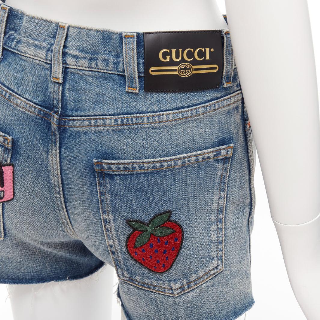 Gray GUCCI pink logo graffiti red strawberry patch blue denim cut off shorts 22
