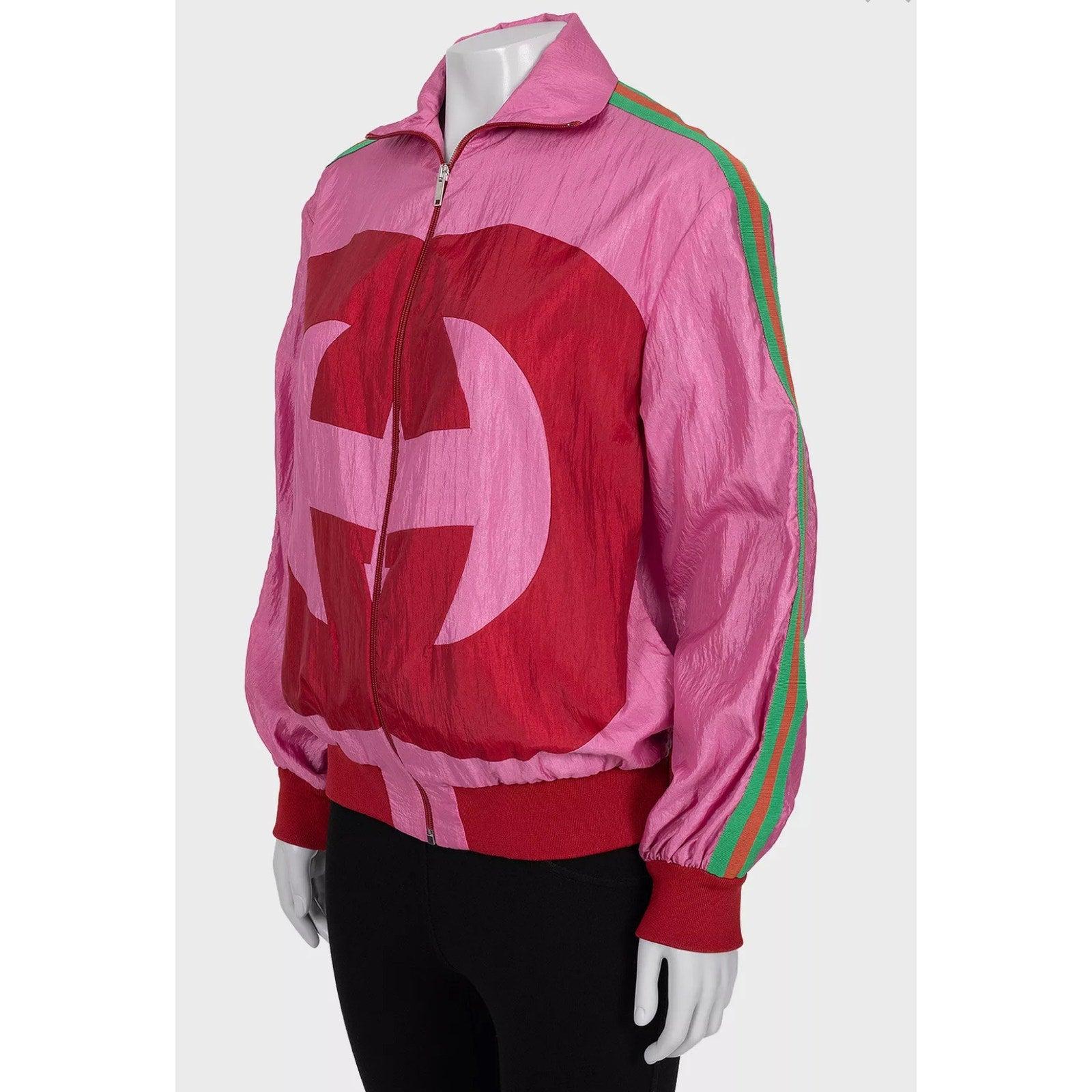 Step out in style with this authentic Gucci windbreaker jacket from the 2018 Collection! This eye-catching piece features a vibrant pink color and the iconic Gucci logo, making it a must-have for fashion enthusiasts. Size: XS (fits true to Gucci