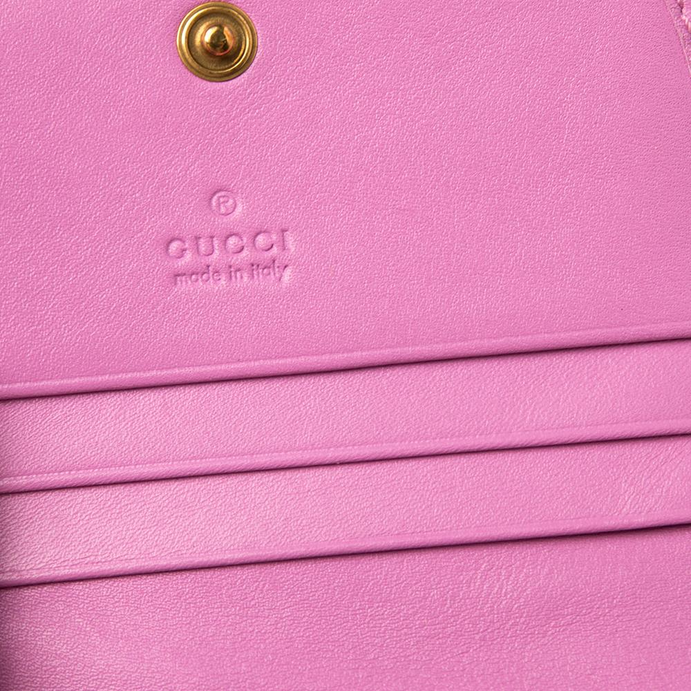 The Marmont collection designed by the House of Gucci has gained popularity globally. This GG Marmont card case is truly a highly functional, luxurious commodity you can add to your closet. It is made with pink matelasse leather externally, and a