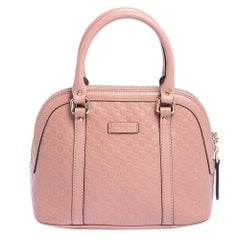 Gucci Rose Microguccissima Mini Dome Bag en cuir
