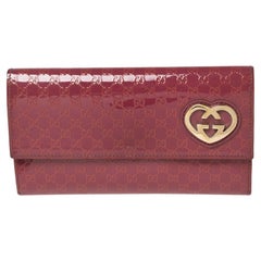 Gucci Pink Microguccissima Patent Leather Lovely Heart Continental Wallet