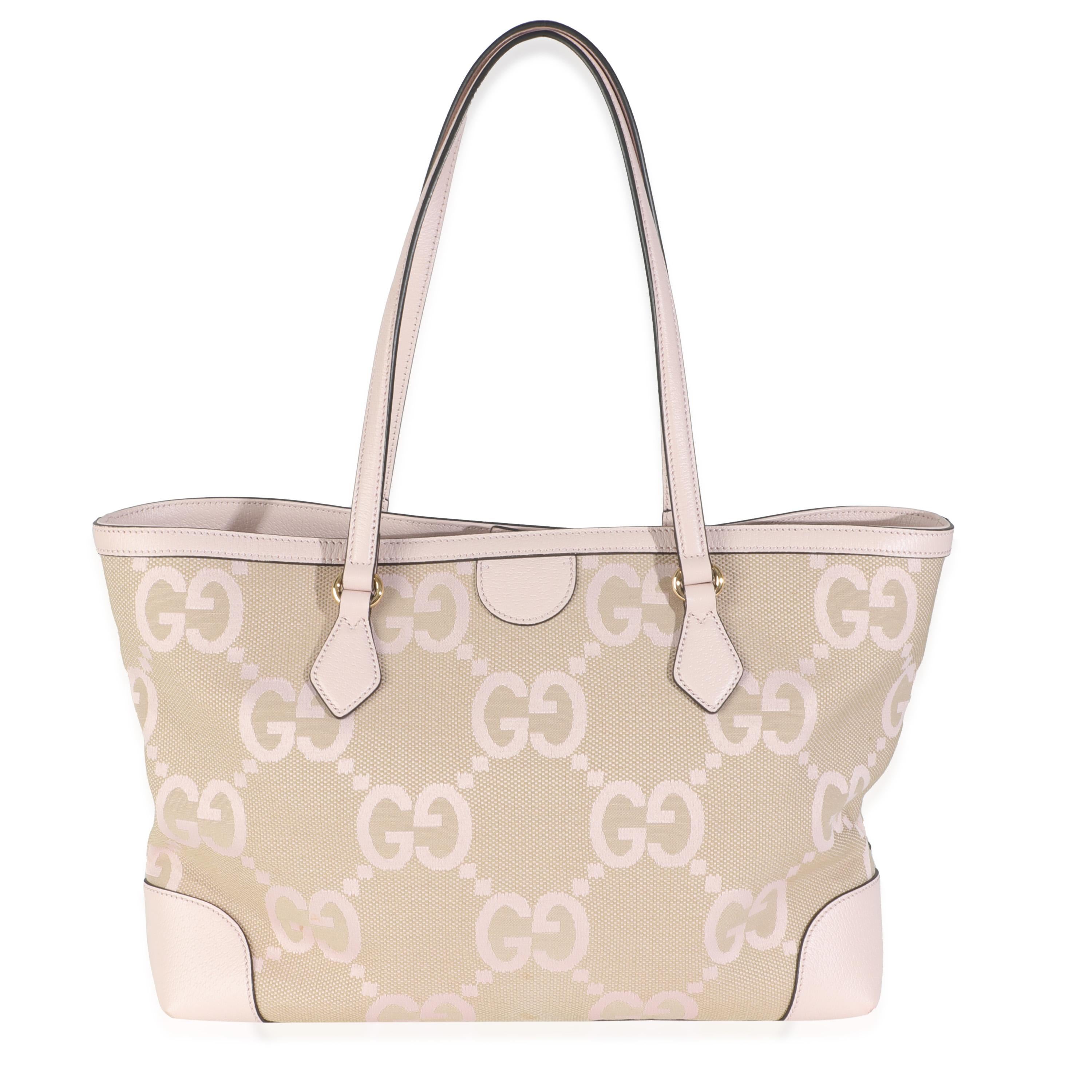 Listing Title: Gucci Pink Monogram Jumbo GG Textured Calfskin Medium Ophidia Shopping Tote
SKU: 146096
Condition: Pre-owned 
Condition Description: Making its debut for Cruise '18, the Ophidia line-up from Gucci takes its name from Greek origins.