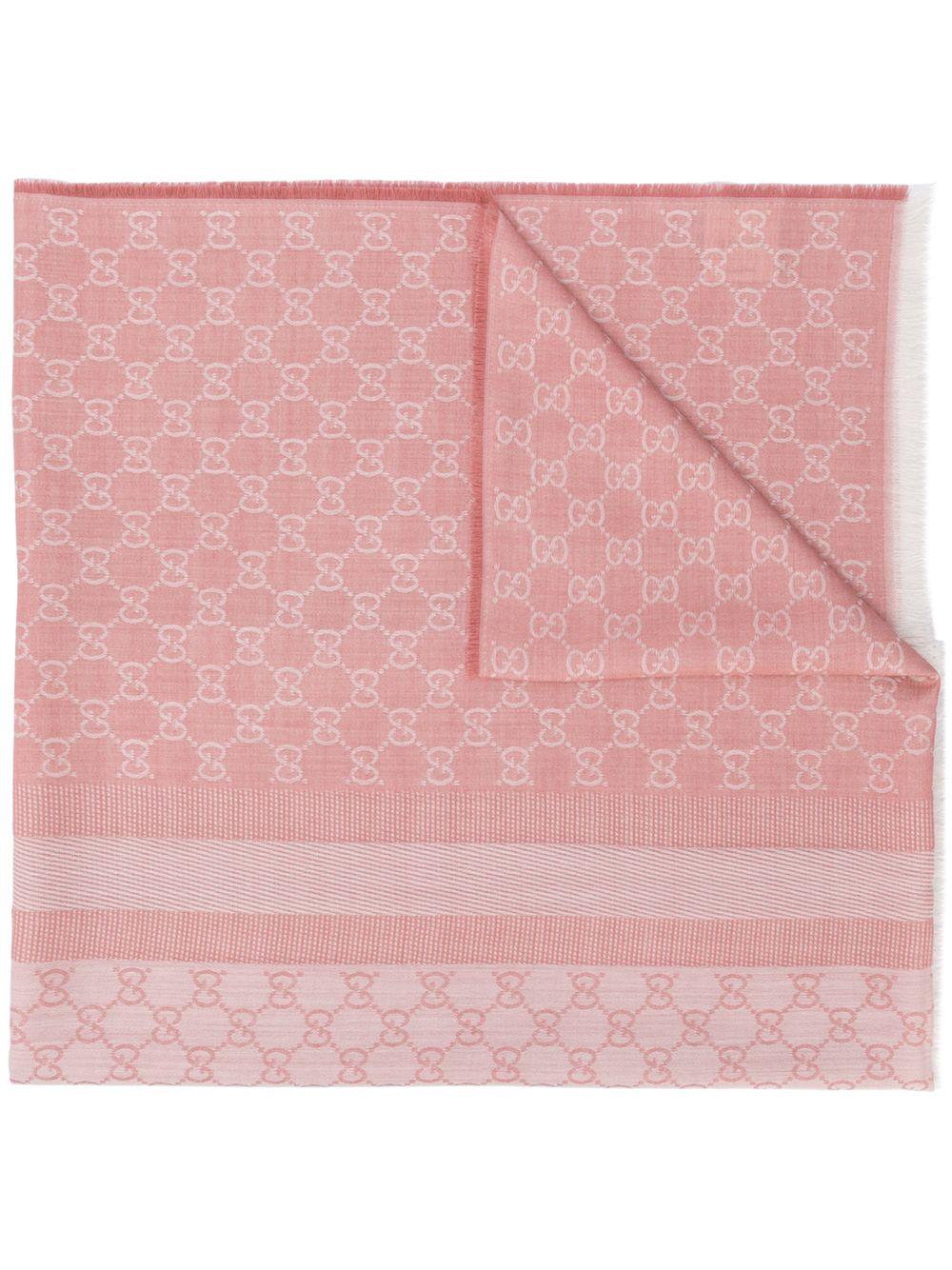 Crafted in Italy from an intricate blend of wool and silk in a neutral palette of powder pink and cream, this monogram print scarf from Gucci features an all-over GG print design and fringed edges.

Colour: Powder Pink

Composition: 80% Wool, 20%