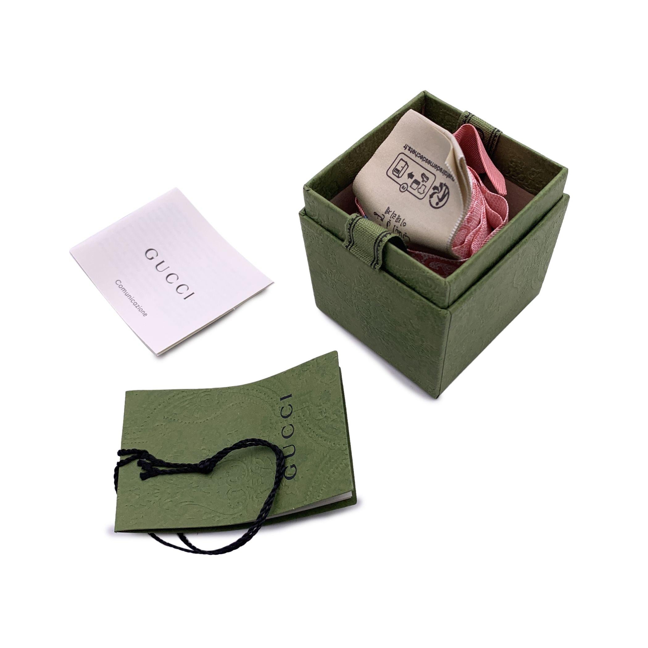 Gucci pink monogram silk Twilly scarf. Gold yellow horsebit. Composition: 100% Silk. Total length: 33 inches - 83.8 cm. Width: 2 inches - 5,2 cm Condition A - EXCELLENT In perfect condition. Never worn. Please check the photos carefully and ask if