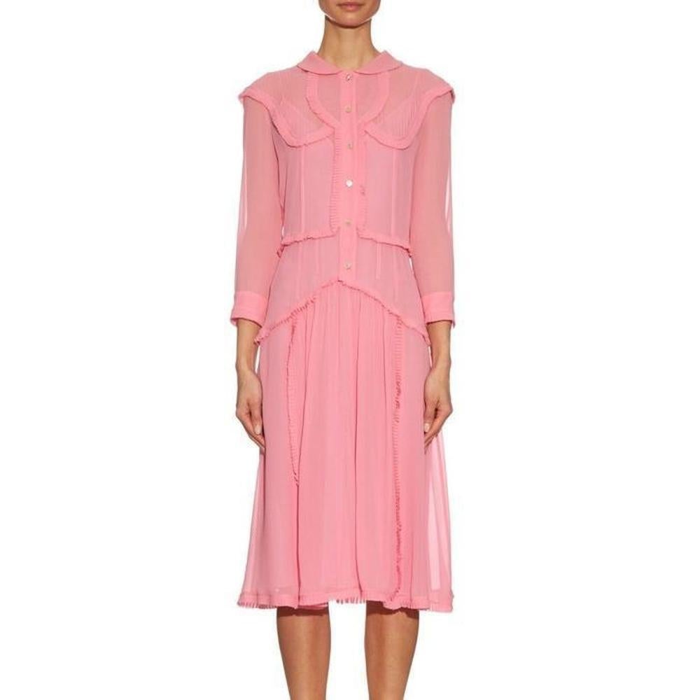 Pink, lightweight sheer silk-georgette. 
Peter Pan collar, crosshatch embroidery. 
3/4-length sleeves, button-fastening cuffs. 
All-over seamed panels, ruffle trim. 
Pintuck and crosshatch embroidery yoke panels. 
Gathered front and back of skirt.