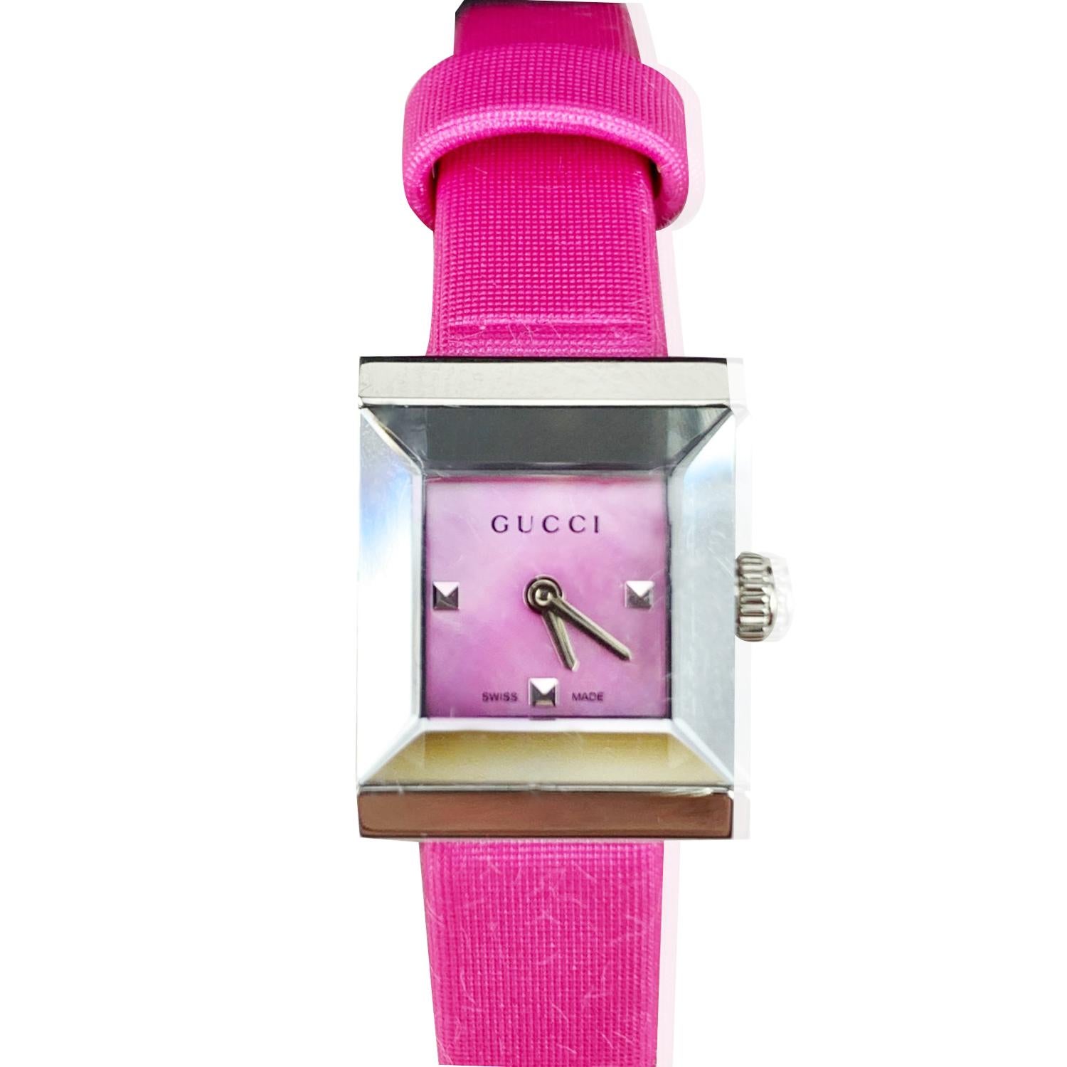Beautiful wristwatch,mod. 128.5, by GUCCI. Small square-shaped stainless steel case with satin and leather adjustable wrist strap. Quartz movement. Sapphire crystal glass. Pink dial. Buckle closure. Total length: 7.75 inches - 19.6 cm. Max
