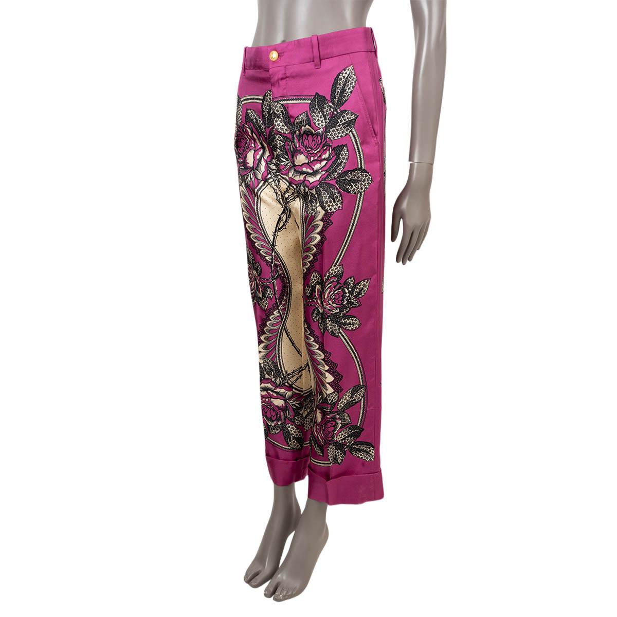100% authentic Gucci floral wide-leg pants in fuchsia, white and black silk (100%). Feature a cropped leg, belt loops and side pockets. Close with a gold-tone button and concealed zipper. Has been worn and is in excellent condition.

2019