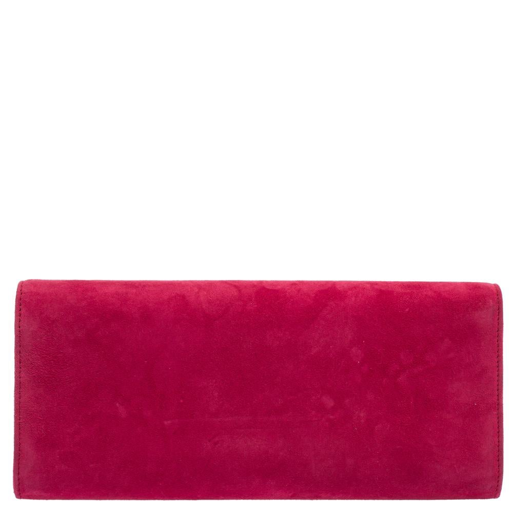 You will adore this Gucci clutch for its elegant and sophisticated look. Crafted from suede, this bright pink Broadway clutch features a crystal GG logo and silver-tone hardware. It's leather-lined interior houses a slip pocket. High on appeal and