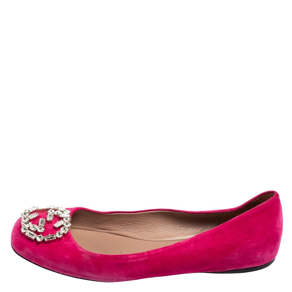 Gucci brings to your closet a pair of plush pink ballet flats that are perfect for making a style statement. Luxurious and graceful, this pretty creation has a suede exterior and features the signature GG logo in crystal.

Includes: Original Box,