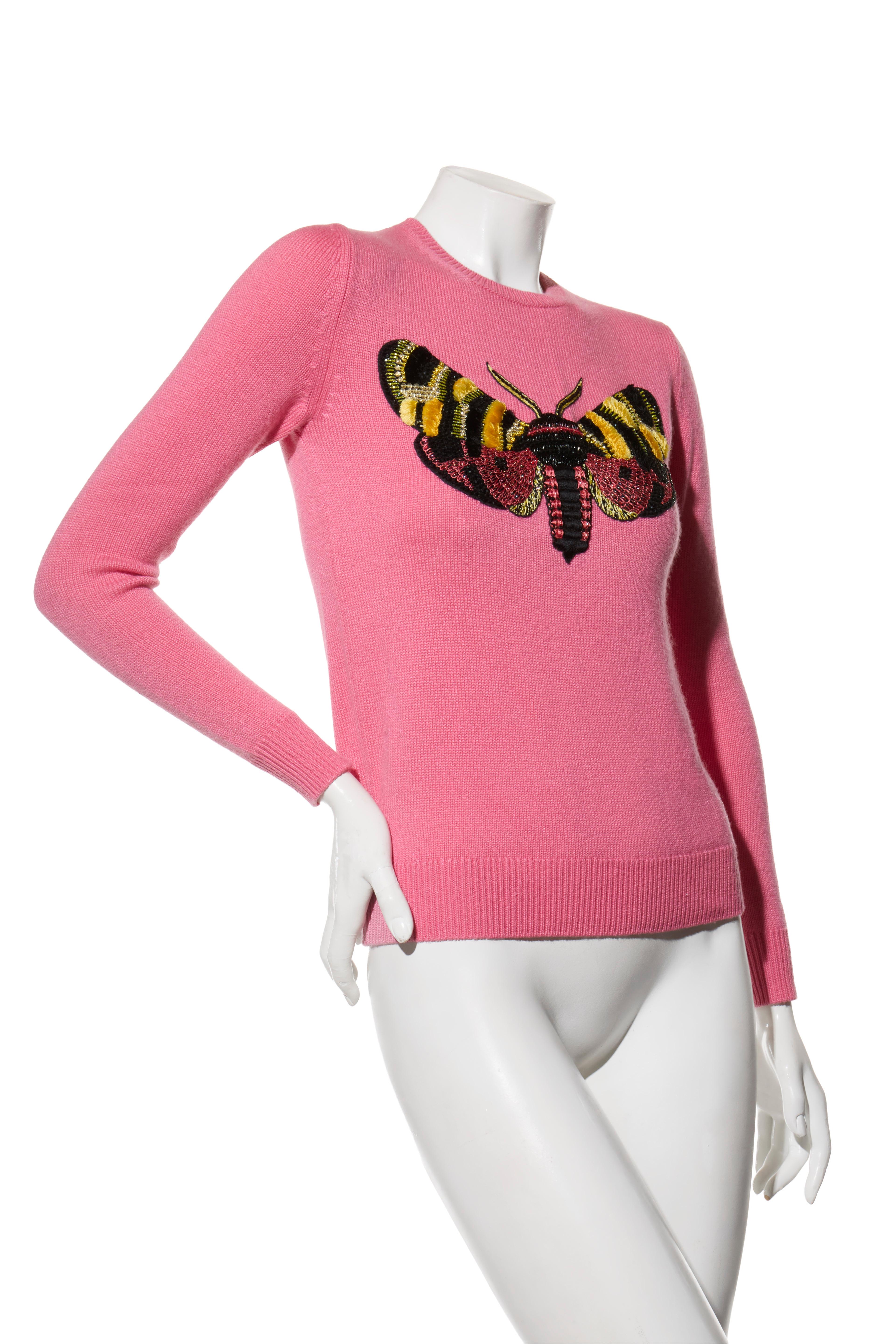 Gucci Pink Wool Sweater with Sequin Butterfly Fall Winter 2016 Size S

Description:
A rare collector’s piece from Gucci’s Fall Winter 2016 collection under Alessandro Michele. Crafted in Italy from fine pink wool, this long-sleeve sweater features