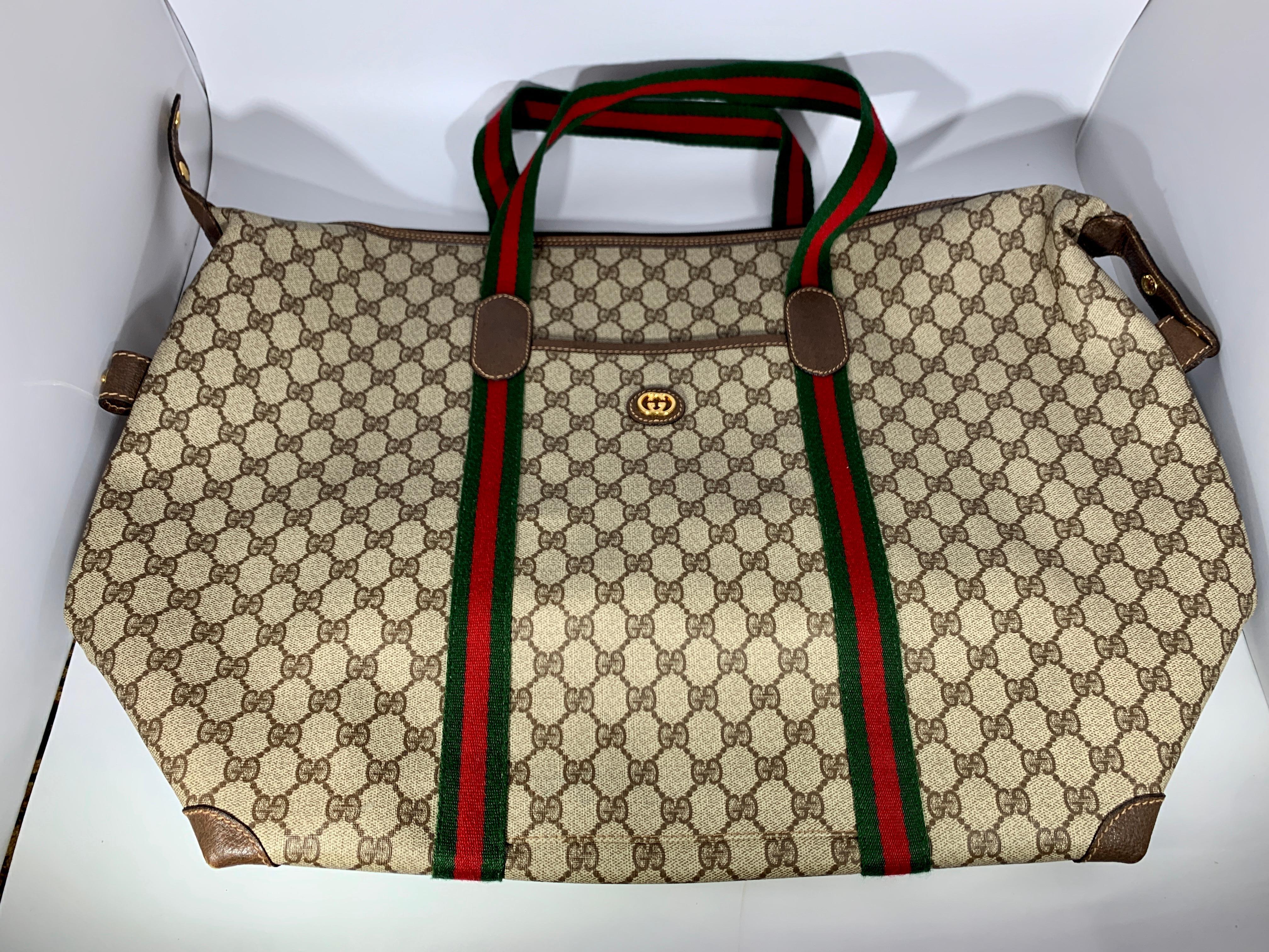 Gucci Plus Vintage Tan Monogram Canvas Large Tote Shoulder Bag Striped Handles
This is an Authentic Vintage Gucci Plus Webby large Tote
Vintage are in!!! They are hard to find and it is in excellent used condition
Top is zippered closed.
One pocket