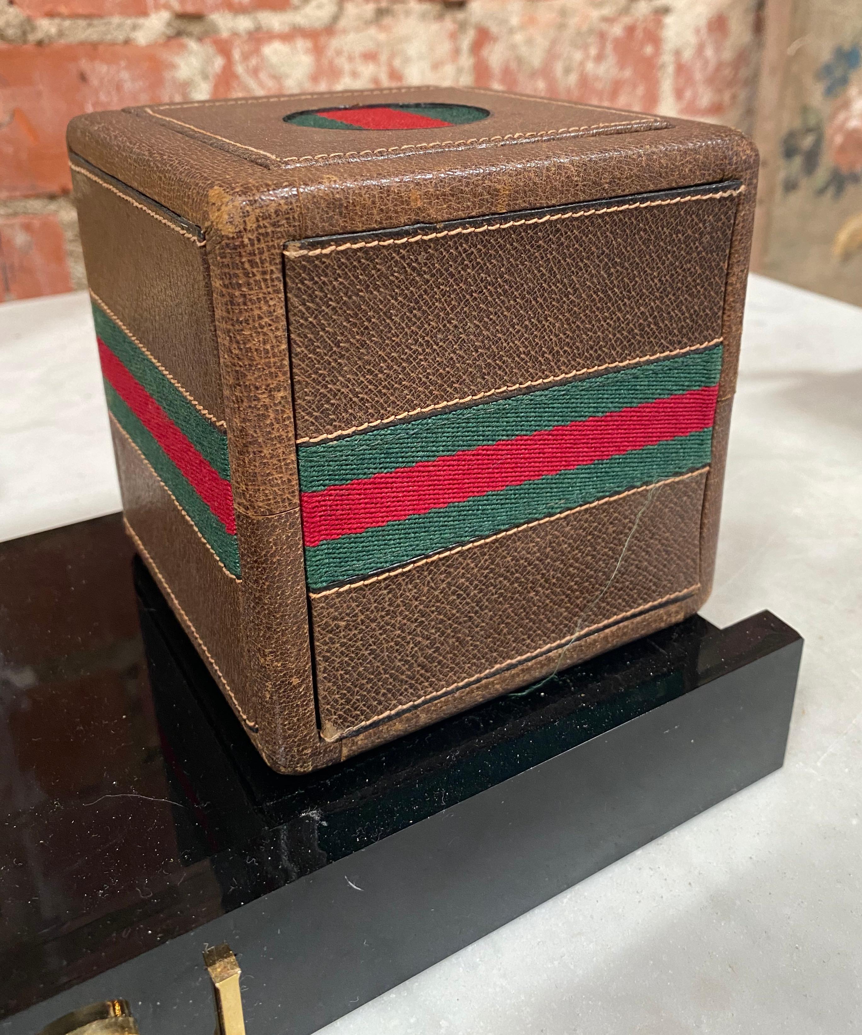 Saddle leather cube gaming set with sliding compartment replete with multiple Bakelite gaming chips, circa 1970s!