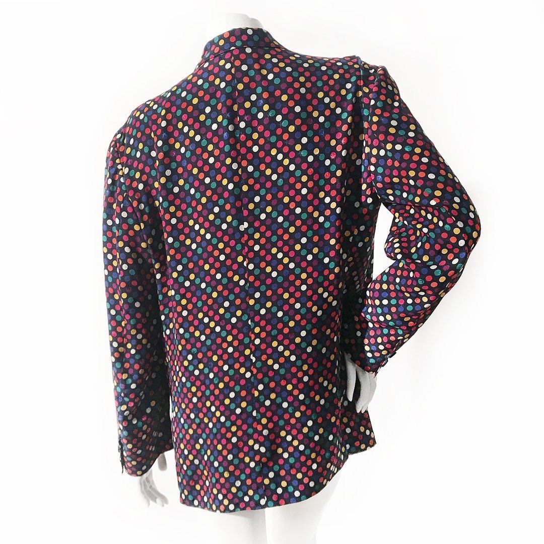 Vintage Silk Blazer by Gucci
Navy with multi-colored dot print
Faint shiny starfish throughout fabric
Waist button closure
Dual front pockets 
Slight padding at shoulders
Double button closure at cuffs 
100% silk
Made in Italy
Condition: Excellent,