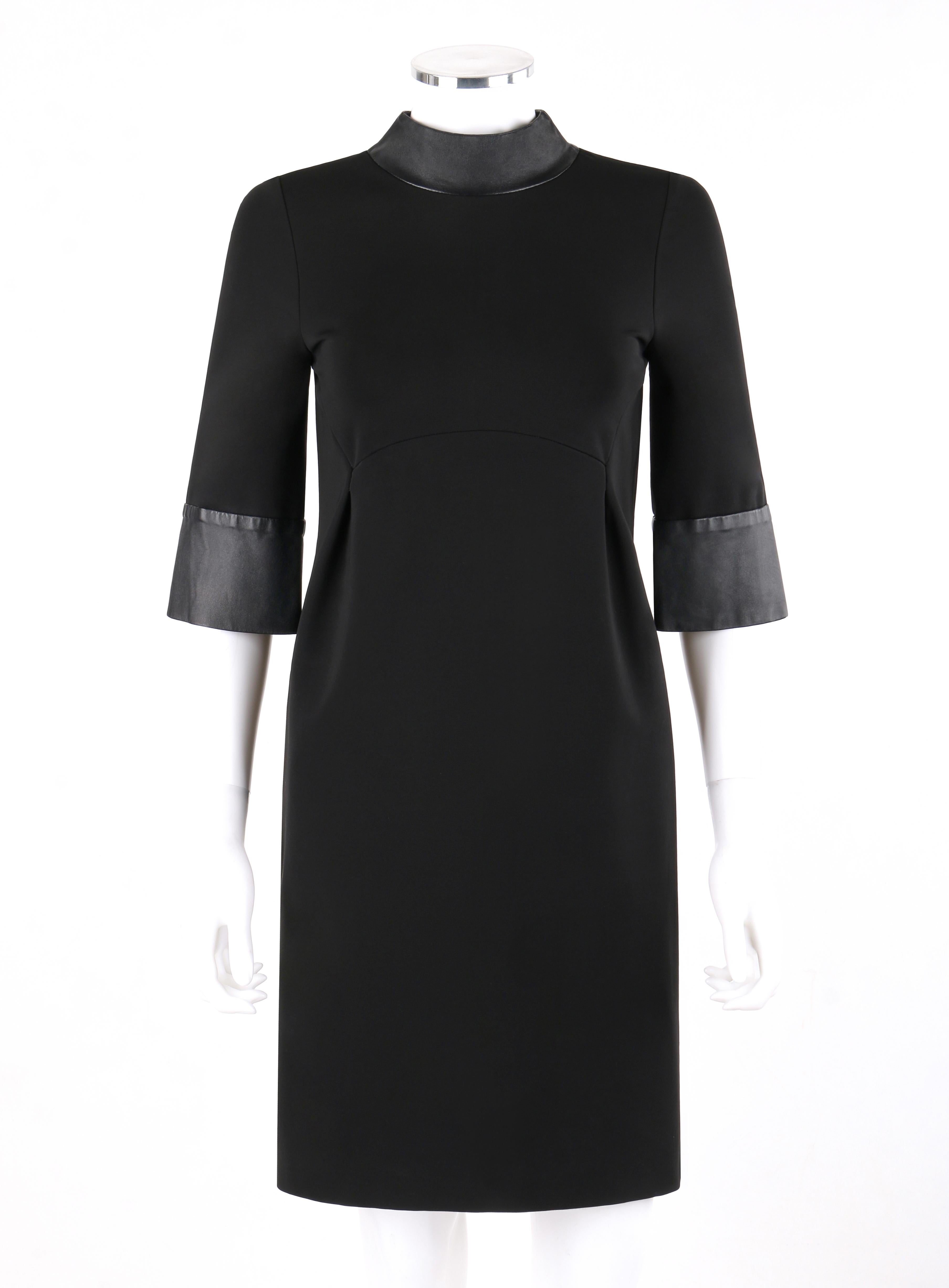 GUCCI Pre-Fall 2014 Black Leather Collar & Cuff Mock Neck Shift Mini Dress - Runway Look #25
  
Brand / Manufacturer: Gucci
Collection: Pre-Fall 2014
Designer: Frida Giannini
Style: Sheath dress
Color(s): Black (exterior, interior)
Lined: Yes
Marked