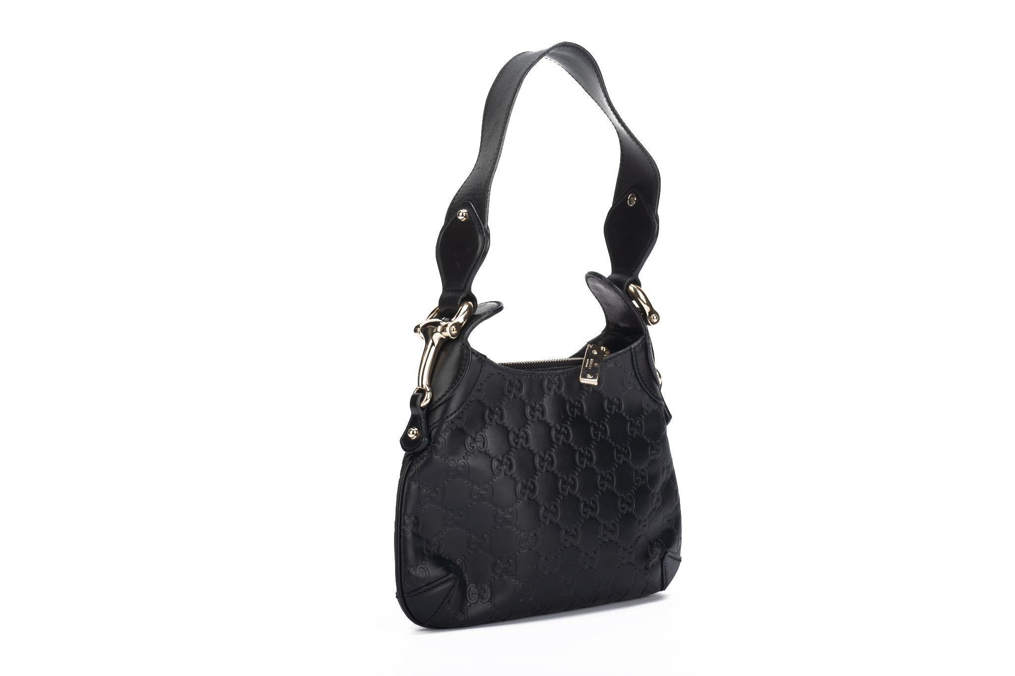 Gucci preloved black leather guccissima print shoulder bag , oversize hardware Shoulder drop 8”. Generic dust cover.