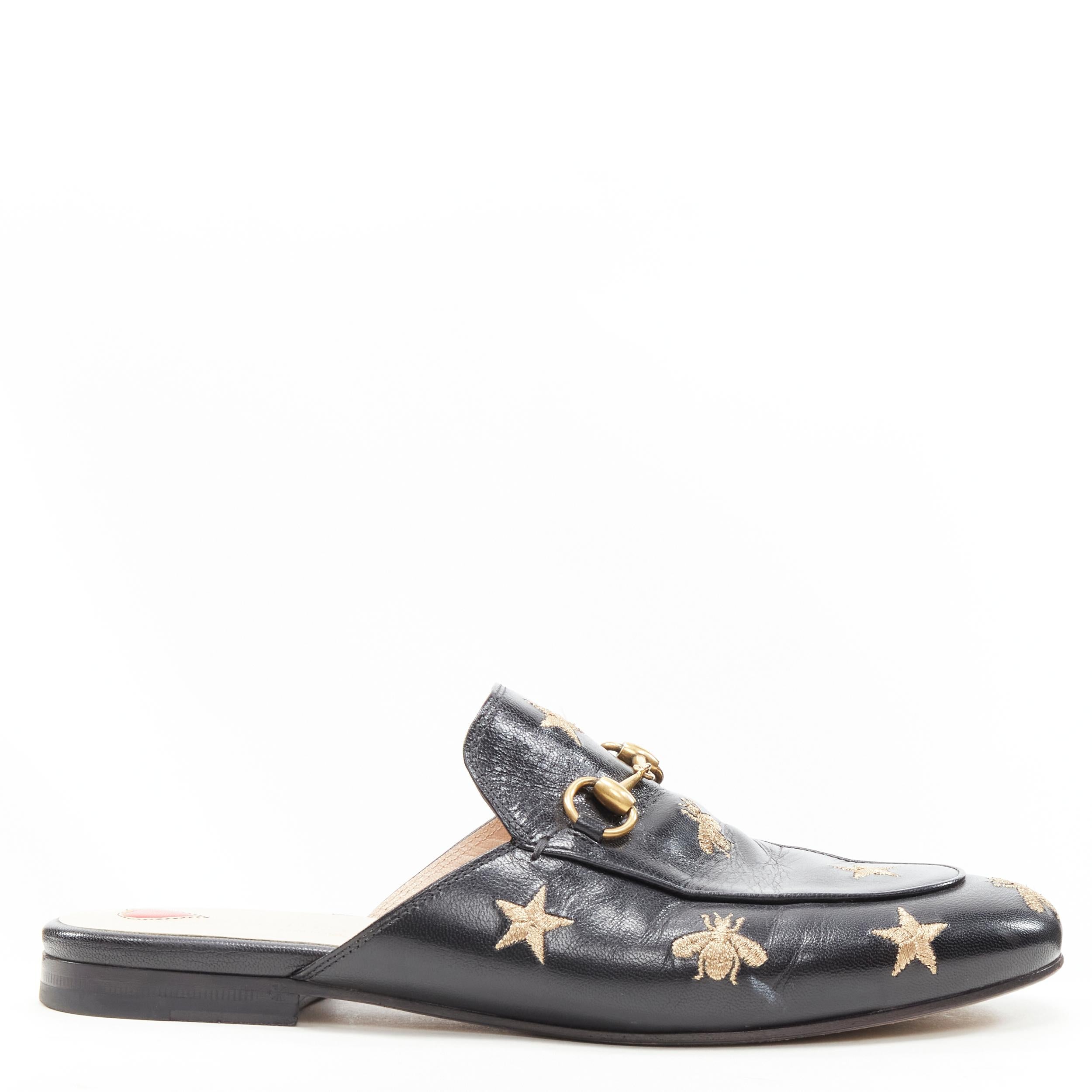 GUCCI Princetown Bees & Stars black gold horsebit loafer slippers EU37.5 
Reference: LNKO/A01932 
Brand: Gucci 
Designer: Alessandro Michele 
Model: Princetown 
Material: Leather 
Color: Black 
Pattern: Bee 
Extra Detail: 505268-D3V00-1000.