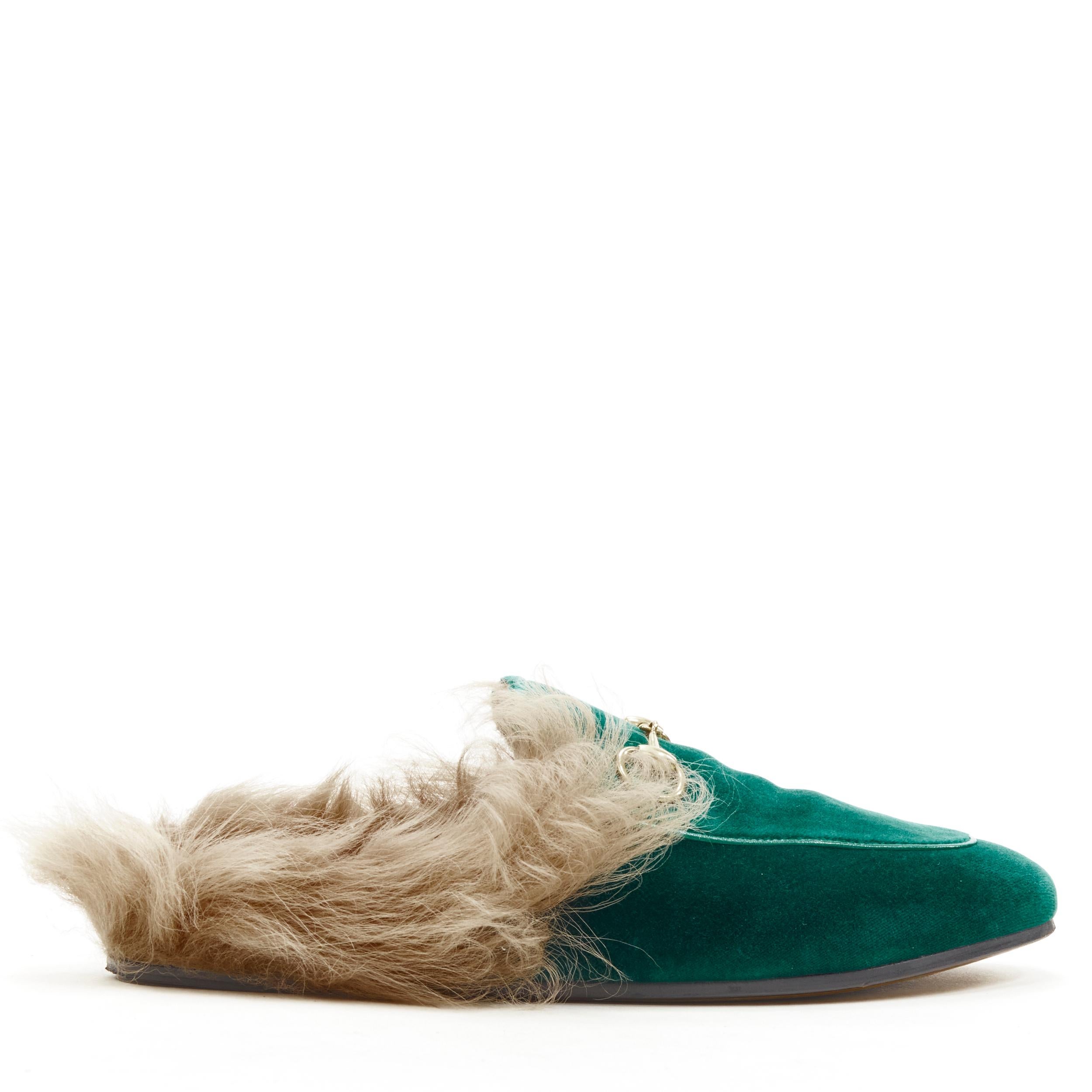 GUCCI Princetown green velvet fur lined gold Horsebit mule loafer EU36 
Reference: ANWU/A00332 
Brand: Gucci 
Designer: Alessandro Michele 
Model: Princetown 
Material: Velvet 
Color: Green 
Pattern: Solid 
Extra Detail: Fully lined in fur. 
Made