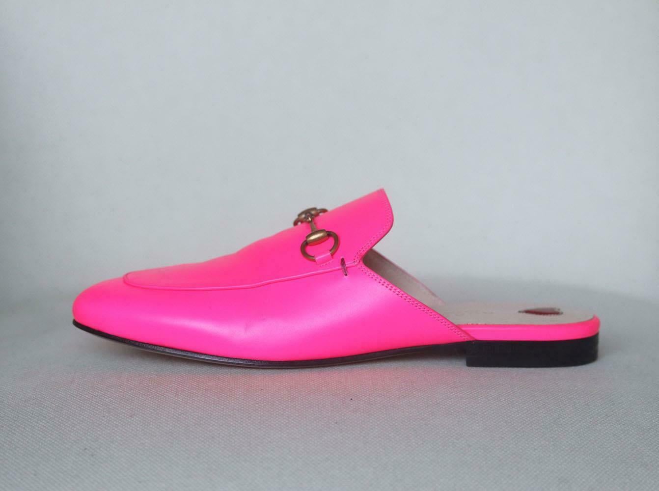 Switch your loafers for Gucci's chic slipper versions this spring, they're crafted from smooth neon-pink leather and are a versatile option for the office or evenings out, this almond-toe pair is adorned with the house's iconic horsebit plaque. Heel
