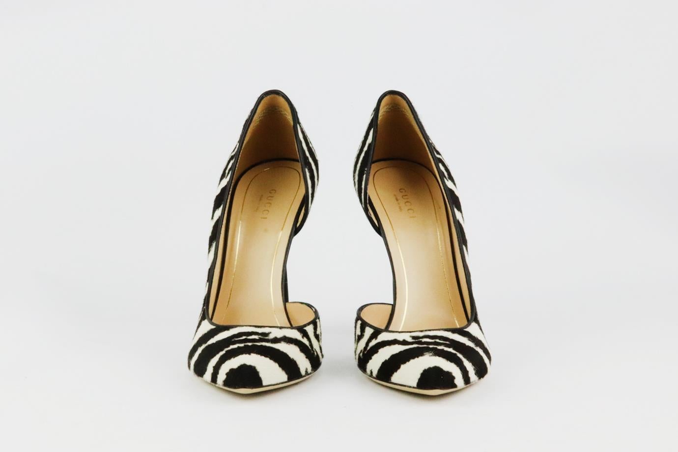 These  pumps by Gucci are a classic style that will never date, made in Italy from white and black zebra print calf-hair, they have sharp pointed toes and comfortable 101 mm heels with d’orsay silhouette to take you to dinner with friends. Heel