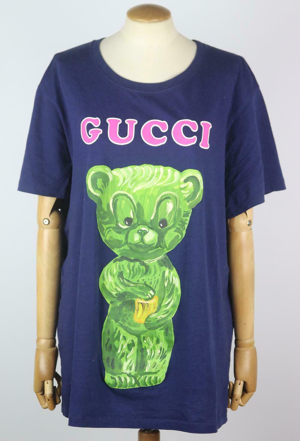 This Gucci 'Gummy Bear' cotton-jersey style is printed with a large gummy bear and the brand's name printed in bold lettering on the front – a reoccurring motifs throughout the collection.
Navy cotton-jersey.
Slips on.
100% Cotton.

Size: Medium (UK