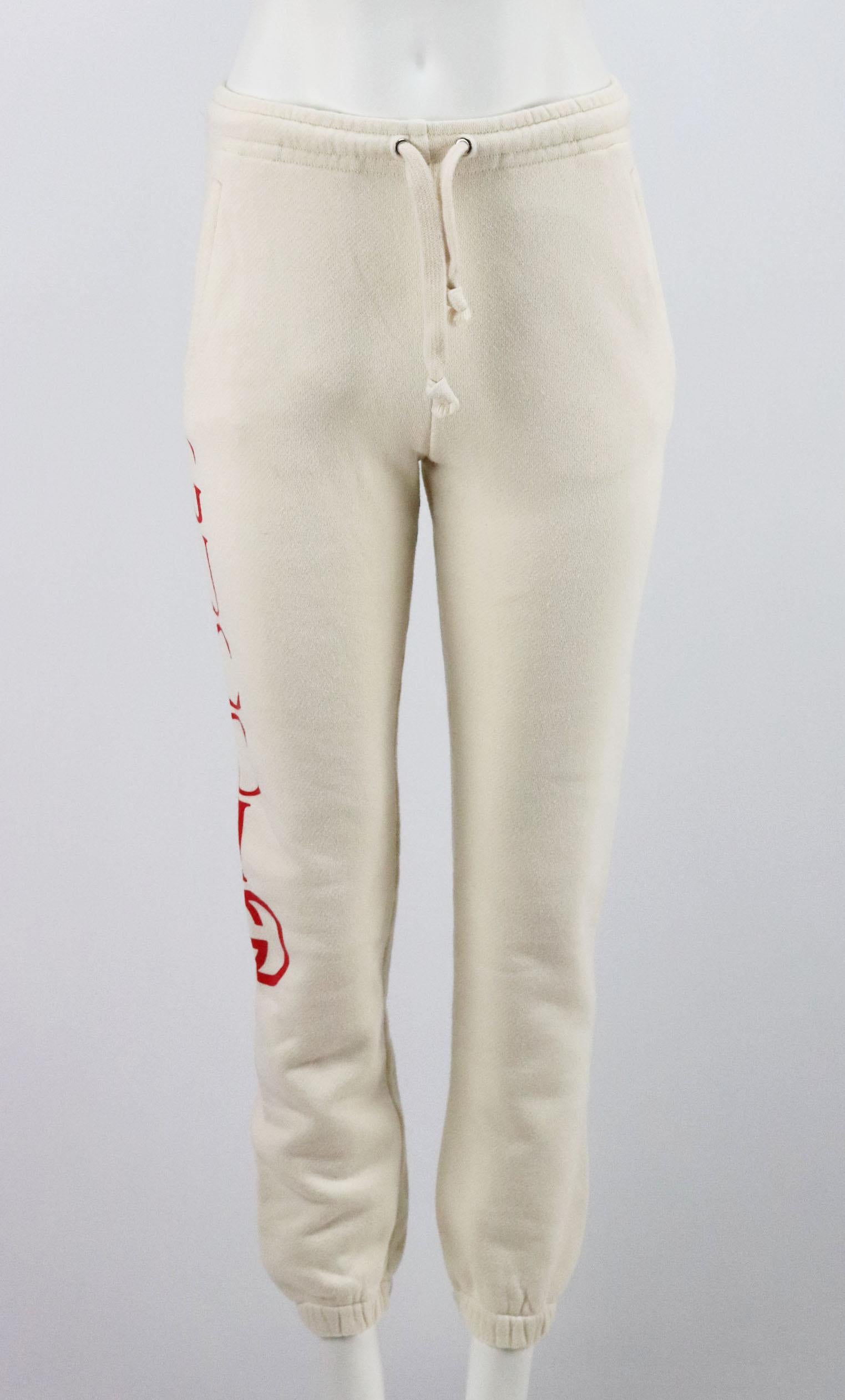 In cream with a bold logo on the side, these cotton sweatpants by Gucci are a comfy pair, youthful and cool with a tapered fit, they are ideal for workouts or off-duty dressing.
Cream and red cotton-terry.
Pull on.
100% Cotton.

Size: Small (UK 8,
