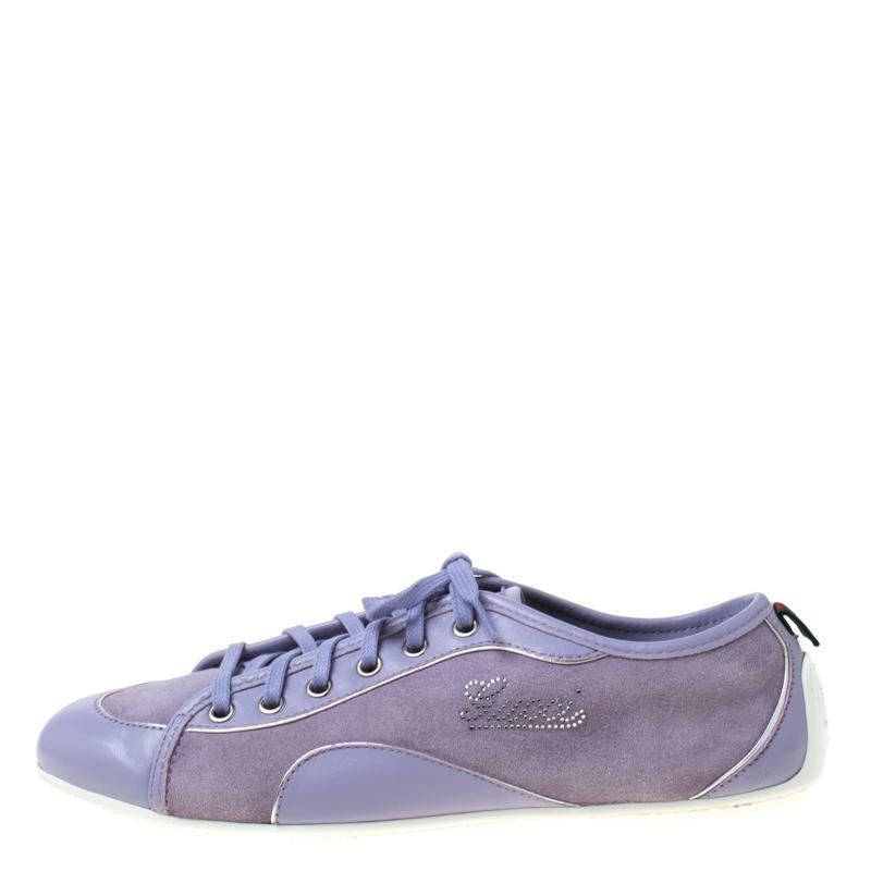 Get heads turning every time you step out wearing these trendy Gucci sneakers, crafted from suede and leather. They have a smart silhouette along with signature web stripes on the counters and embellished Gucci logos on the quarters.

Includes: