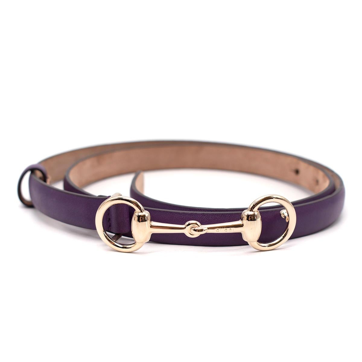 Gucci Purple Leather Pale Gold-Tone Horsebit Belt 85

- Narrow leather belt in a purple tone
- Pale gold-tone Horsebit press-stud fastening
- Can be worn on the waist or hip

Materials:
Leather

Measurements:
Length - 96cm
Width - 1.5cm

Made in