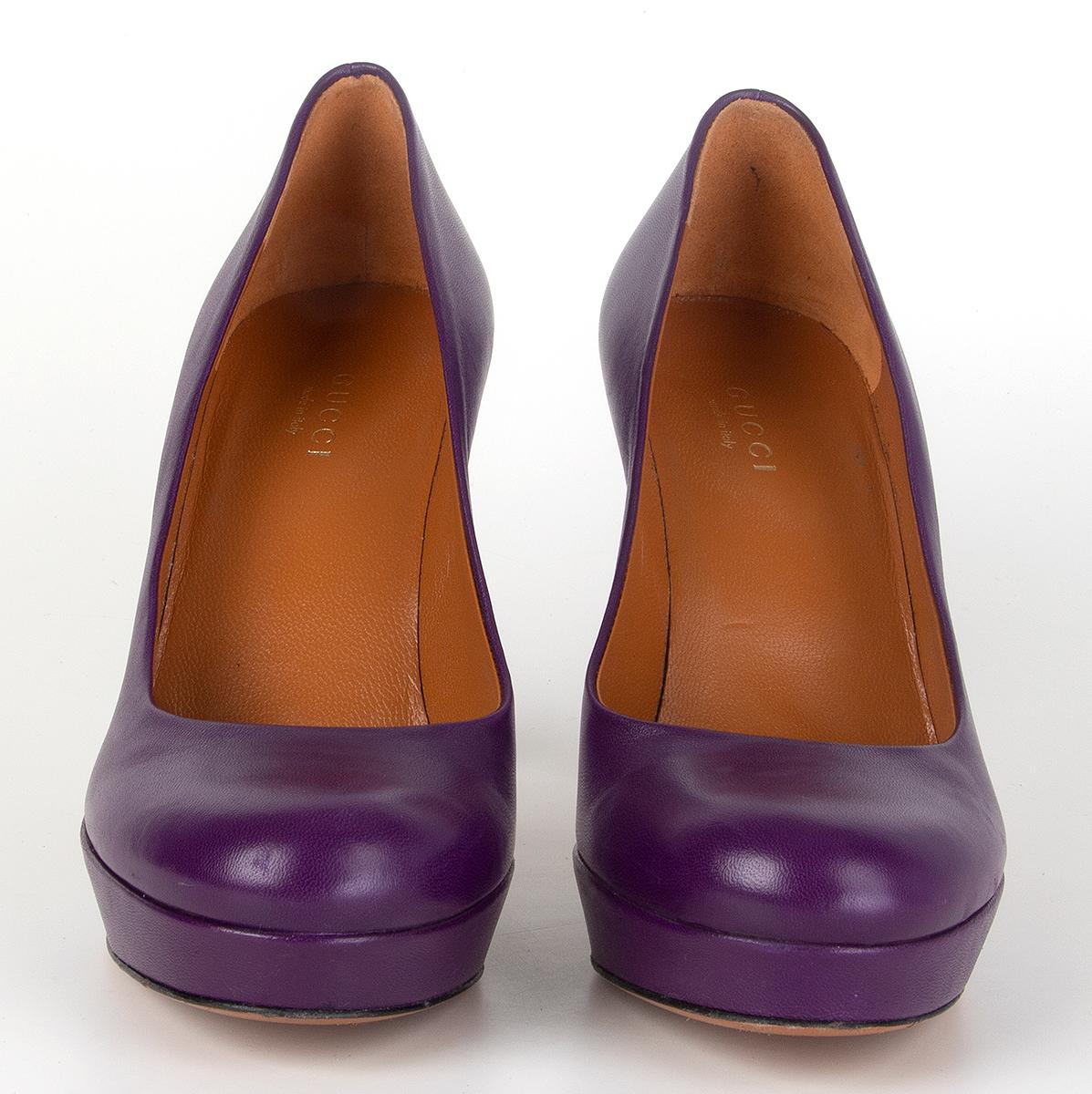 100% authentic Gucci round-toe platform pumps in purple calfskin. Have been worn and are in excellent condition. Come with dust bag. 

Measurements
Imprinted Size	35.5
Shoe Size	35.5
Inside Sole	23cm (9in)
Width	7cm (2.7in)
Heel	10cm