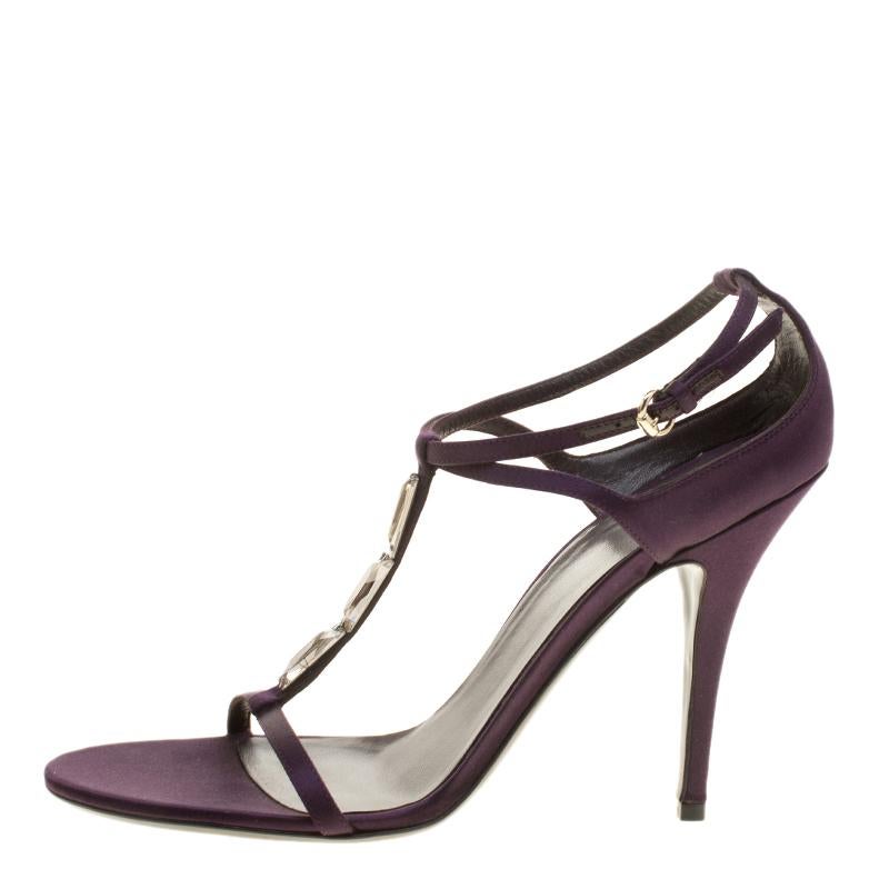 Styled with perfection, this purple Gucci number is crafted in suede as a t-strap and completed with ankle fastenings. The artful crystal detailing on the exterior, coupled with 11.5 cm heels makes it a pair that's chic and modern.

Includes: Extra
