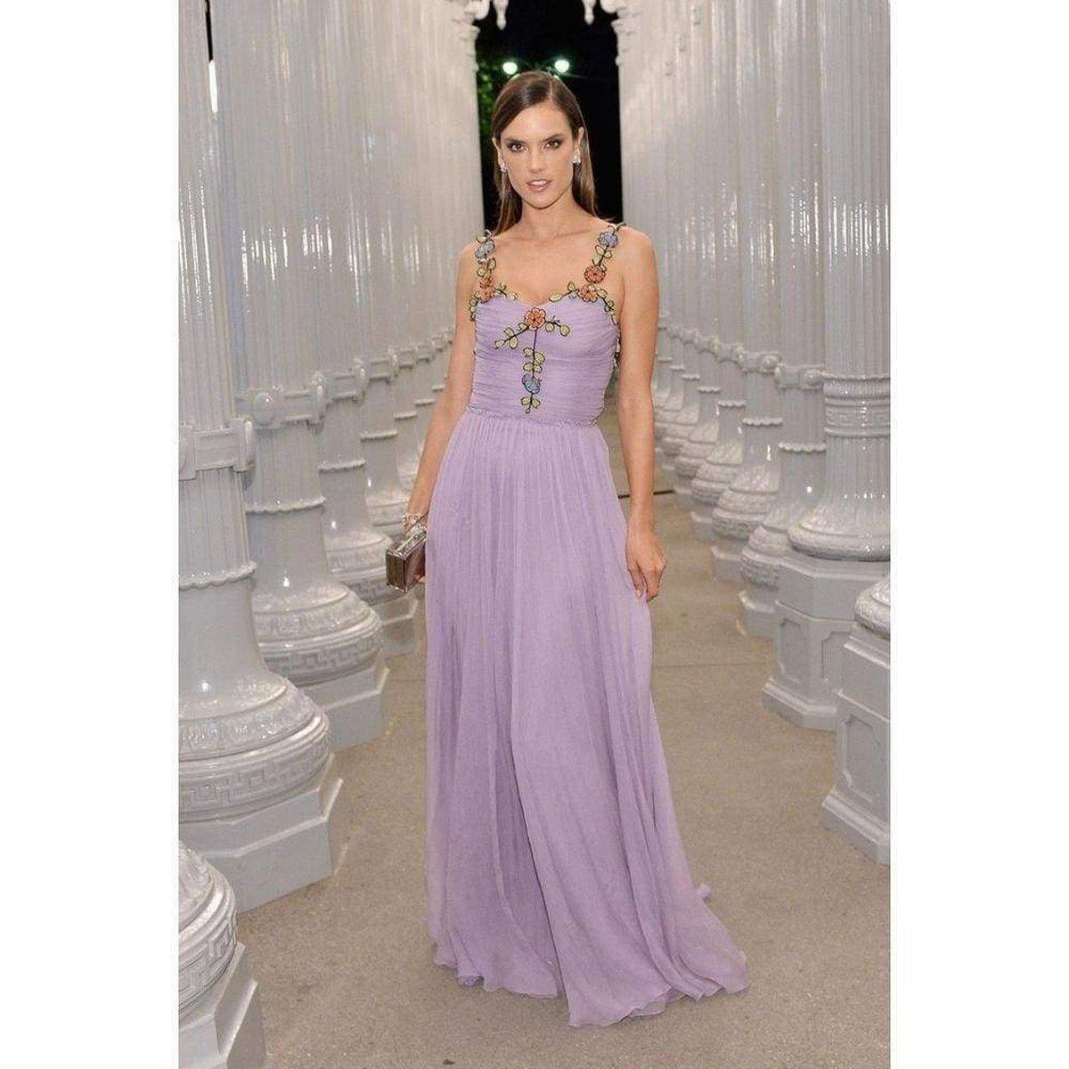Follow us on Insta @runwaycatalog
A beautiful flowing chiffon gown with a multilayer skirt that gathers at the waist. 
The top is decorated with vine and flower appliqués that adds an ethereal dimension to the gown. 
Pale lavender chiffon crepe.