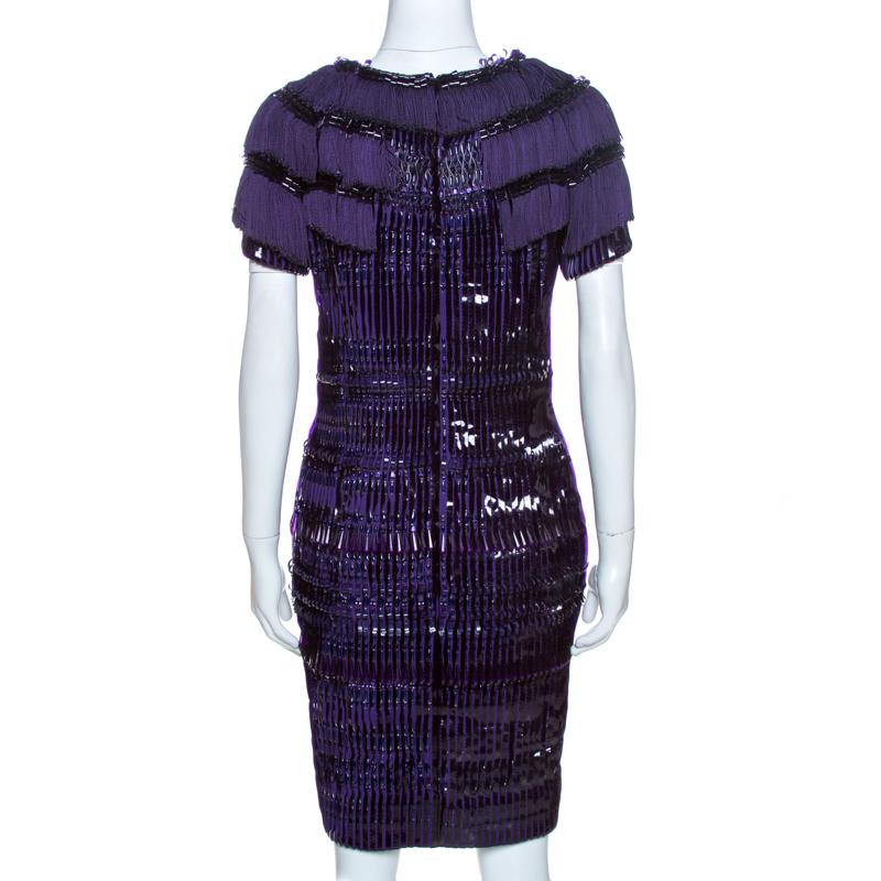 Dress up in this Gucci dress and have everyone go ga-ga over your stylish ensemble. Crafted meticulously, this statement-making dress is worth the splurge. It is made from 100% silk and comes in a lovely shade of purple. It is styled with beautiful