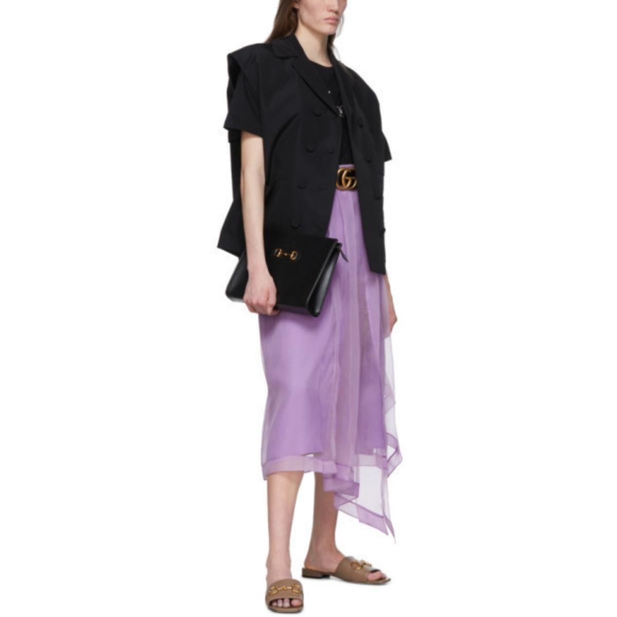 Silk organza skirt with slit. 
Detachable tonal crepe underskirt with elastic waistband. 
Asymmetrical design. 
Pleated front. 
Front left slit. 
Side zip
Color: Purple
100% silk.
Lining (interior removable)73% acetate, 27% silk)
Made in Italy