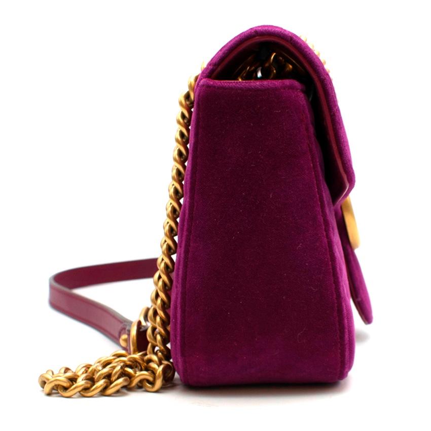 Gucci Purple Velvet Marmont Quilted Shoulder Bag

- Gold Hardware - front flap with push lock fastening - GG logo on the front - Adjustable chain strap with leather detail can be worn as a double or single strap - Satin lining - Zip closure interior