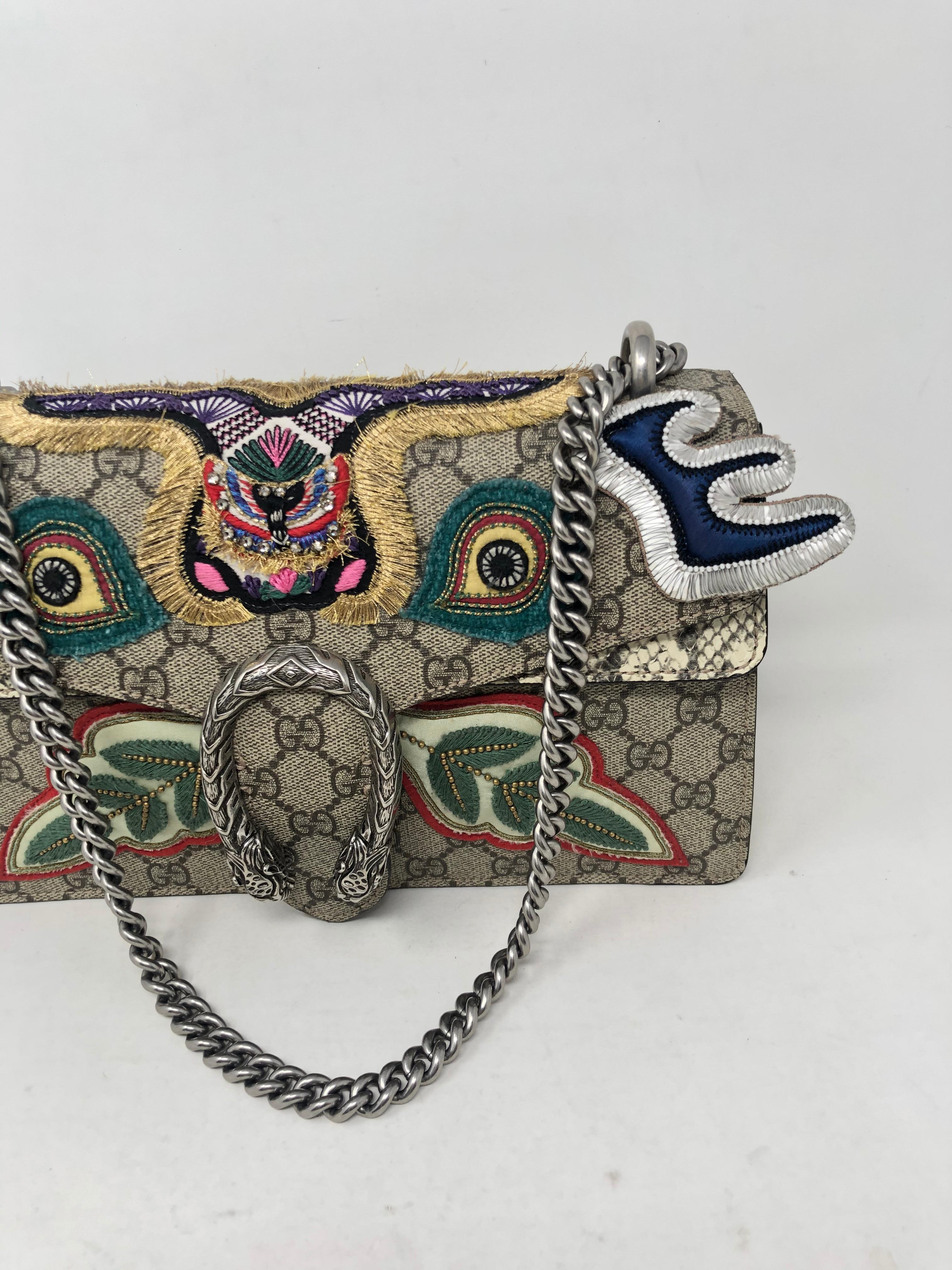 Gucci Python Dionysus Bag Limited Edition. Large size monogram with python leather sides. Unique embroidered pattern on bag. Beautiful bag. Rare and limited. Guaranteed authentic. 